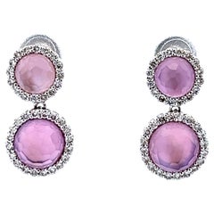 Eleganti orecchini con pietre rosa