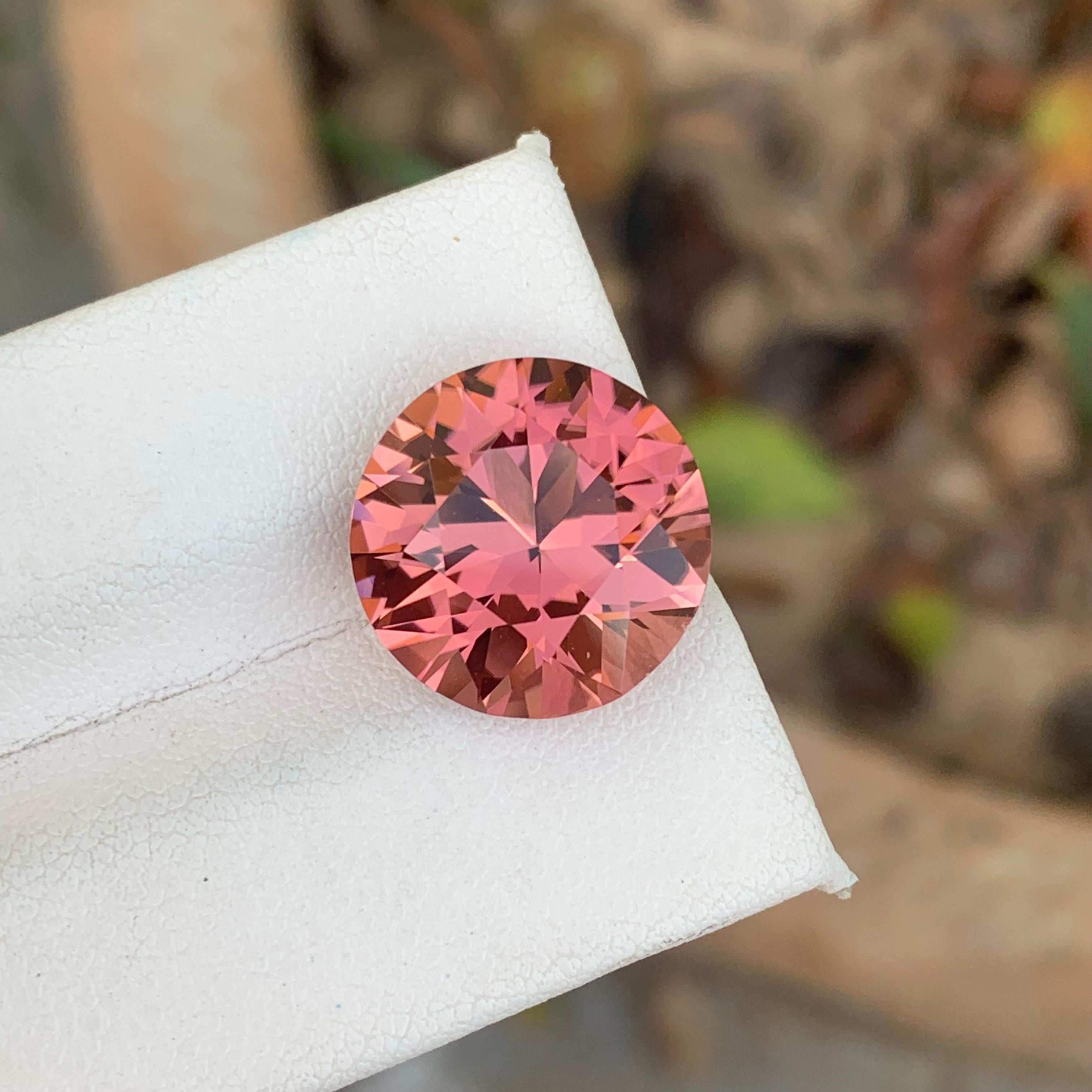 Gemstone Type :  Rubellite Tourmaline
Weight : 9.90 Carats
Dimensions : 14.6x14.6x9 Mm
Origin : Afghanistan
Clarity :  Loupe Clean
Shape: Round
Color: Pink
Certificate: On Demand
Pink tourmalines with reasonably saturated dark pink to red colors and