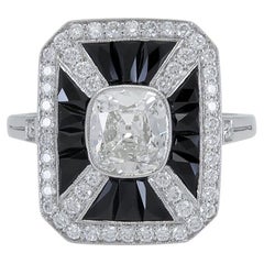 Elegant Platinum 1.10 Ct Onyx and 0.90 Carat Center Diamond Art Deco Style Ring