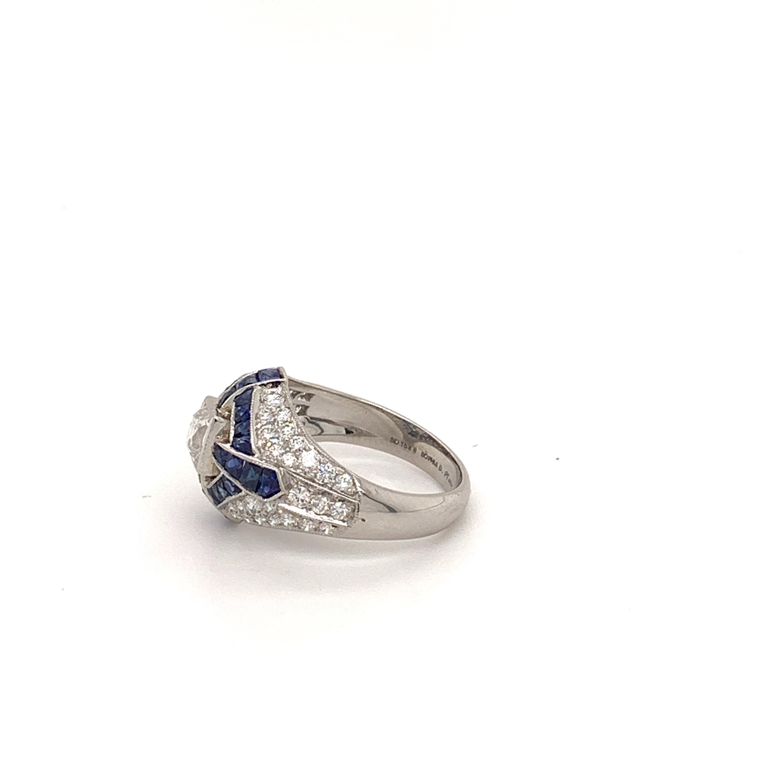 Art deco inspired ring that features 2.60 carat blue sapphire surrounded with 1.29 carats of diamond. 

Sophia D by Joseph Dardashti LTD has been known worldwide for 35 years and are inspired by classic Art Deco design that merges with modern