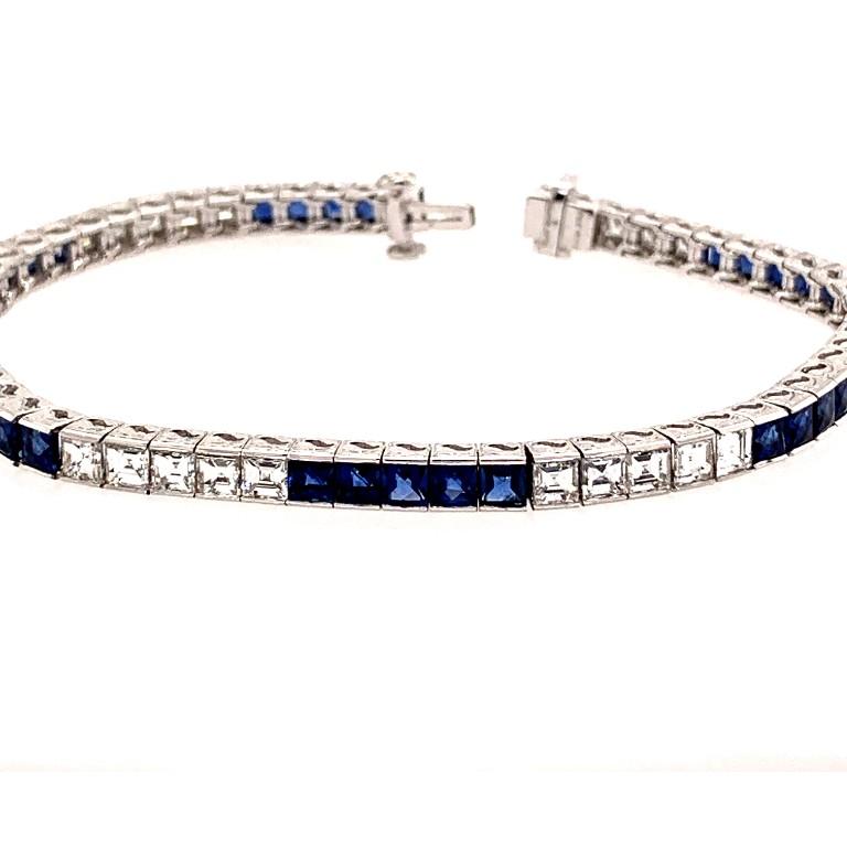 Elegant platinum with square diamond with the total weight of 5.44 carat and stunning blue sapphire weighing 5.26 carat bracelet. 

                          