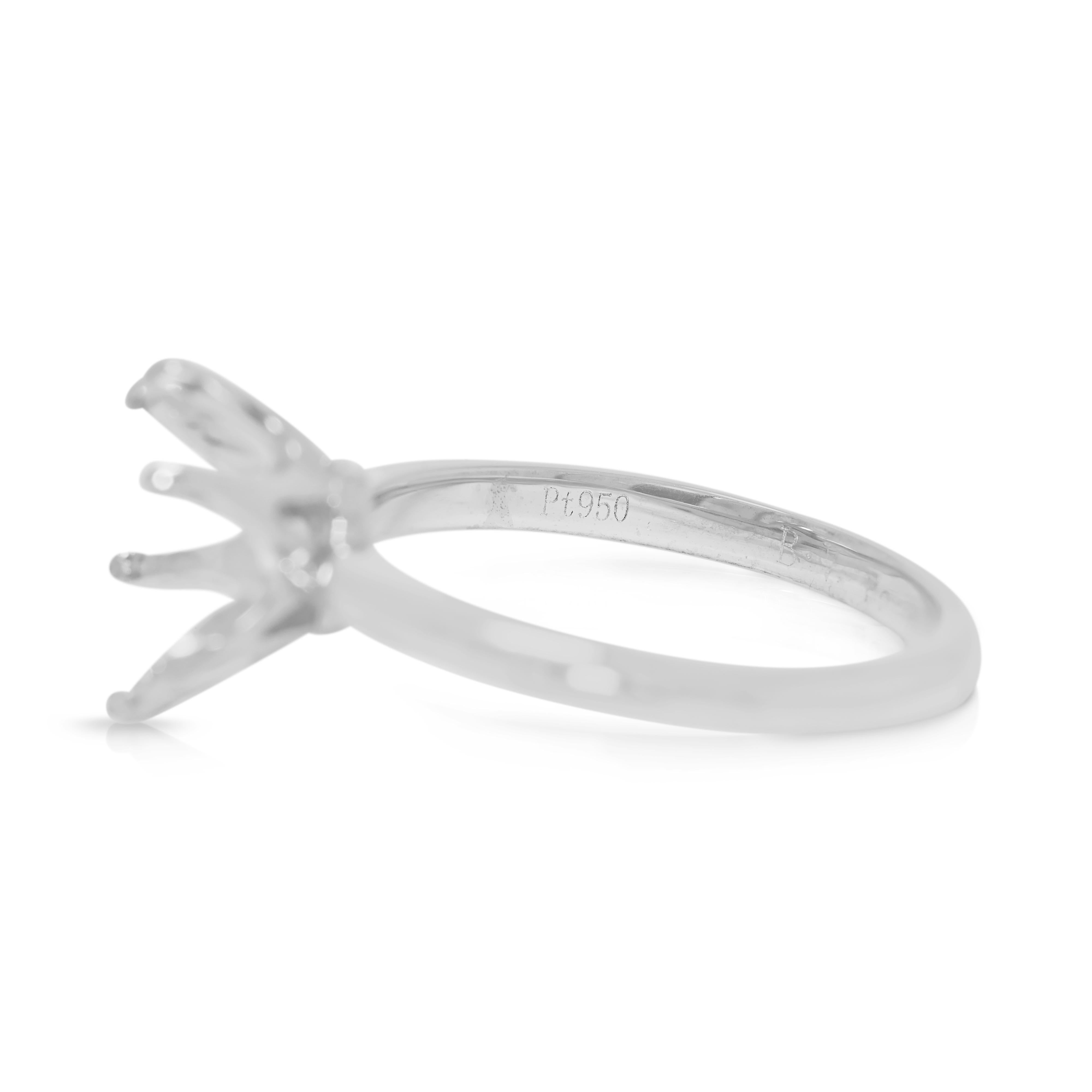 Designed for timeless elegance, this refined platinum 950 ring setting offers a sleek and luxurious foundation for your dream centerpiece. Crafted with precision, its high-quality platinum composition ensures durability and brilliance, making it an