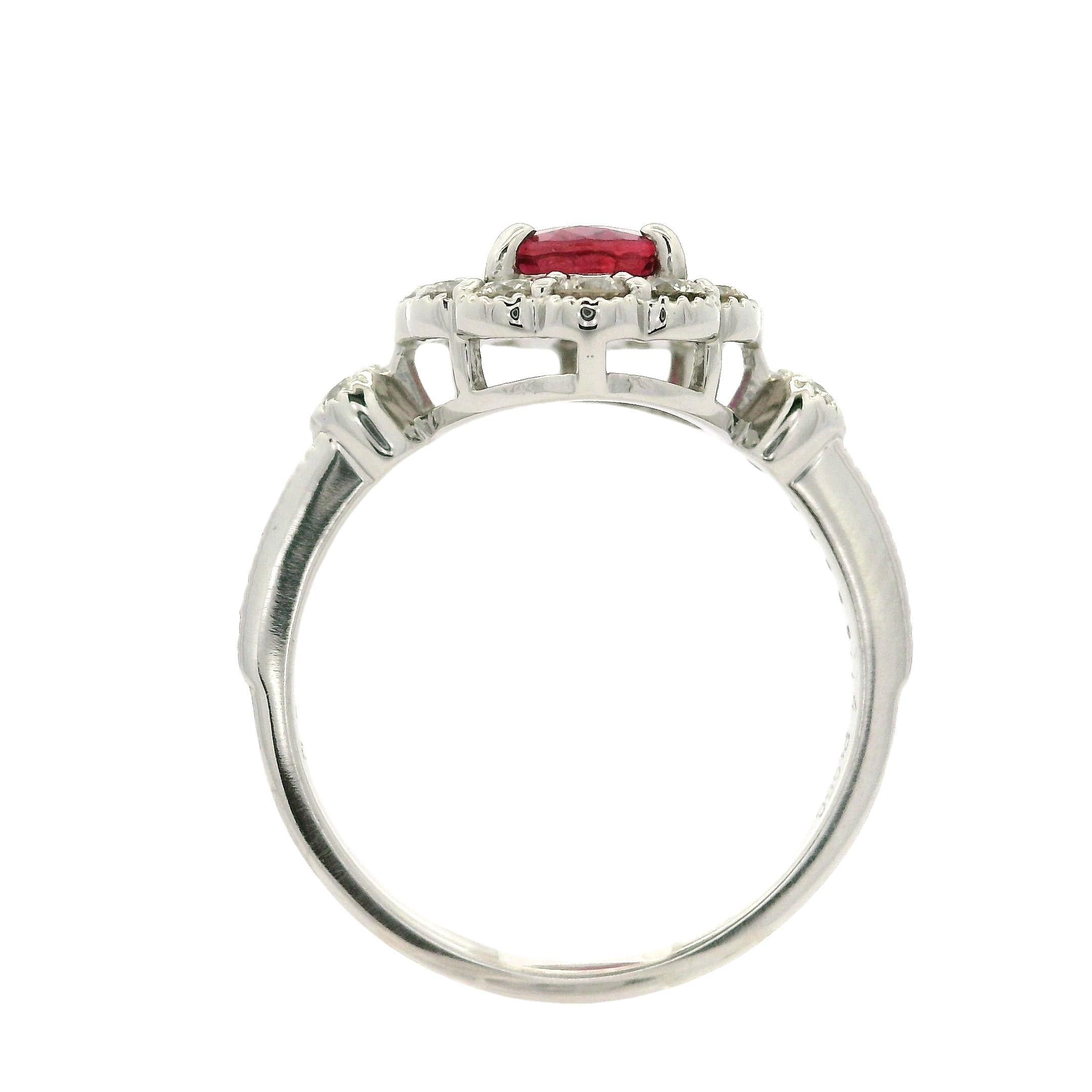 --Stone(s):--
(1) Natural Genuine Ruby - Elongated Oval Cut - Prong Set - Reddish Pink Color - No Heat - Clean Brilliant - 1.14ct (exact - certified & stamped)
** See Certification Details Below for Complete Info **
(24) Natural Genuine Diamonds -