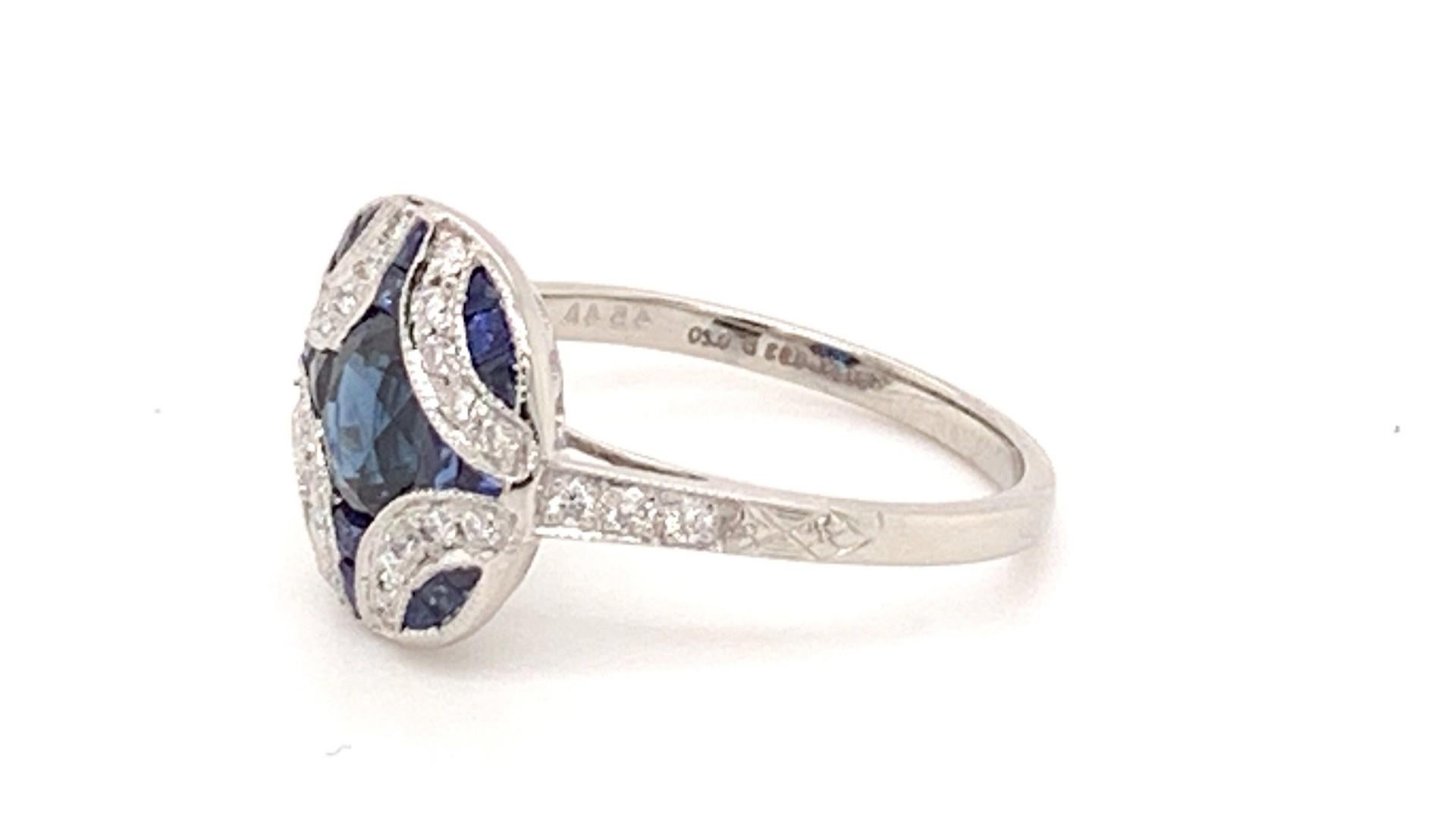 Stunning platinum with center sapphire weighing 0.93 carat accented with  small dazzling sapphires weighing 0.43 carat together with brilliant diamond stones weighing 0.20 carat designed  to enhance the overall style , beauty, personality,  and