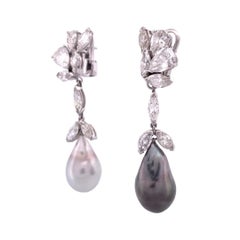 Elegant Platinum Diamond Dangle Earrings