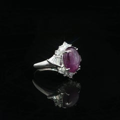 Elegant Platinum GIA 4.71ctw Oval Cabochon Purple Star Sapphire w/ Diamond Ring