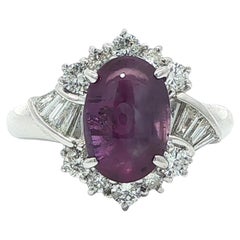 Elegante Anillo de Platino GIA 4,71ctw Zafiro Estrella Púrpura Cabujón Ovalado c/ Diamante