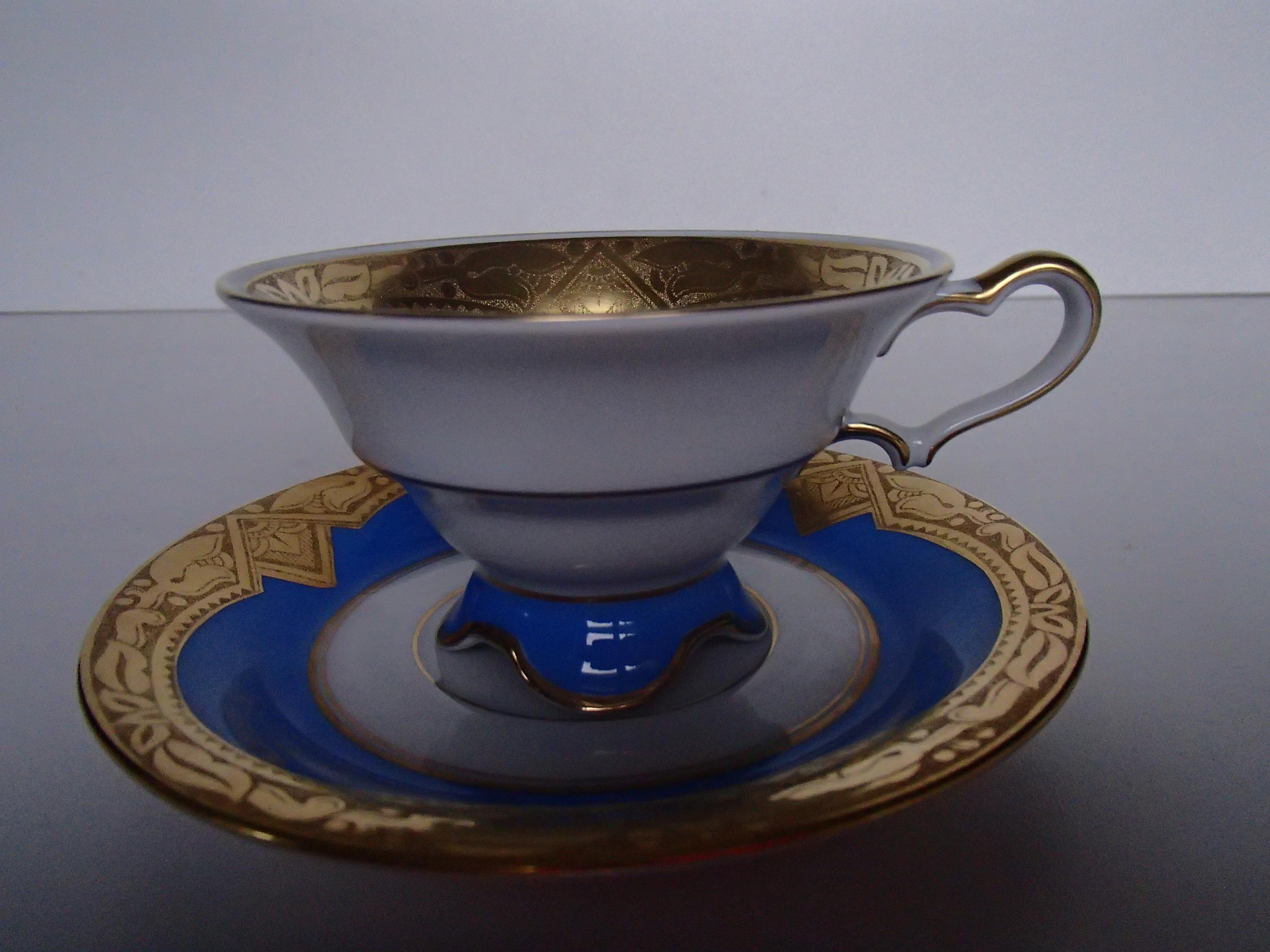 elegant porcelain coffee cup by Hutschenreuther Selb Bavaria gold plated.