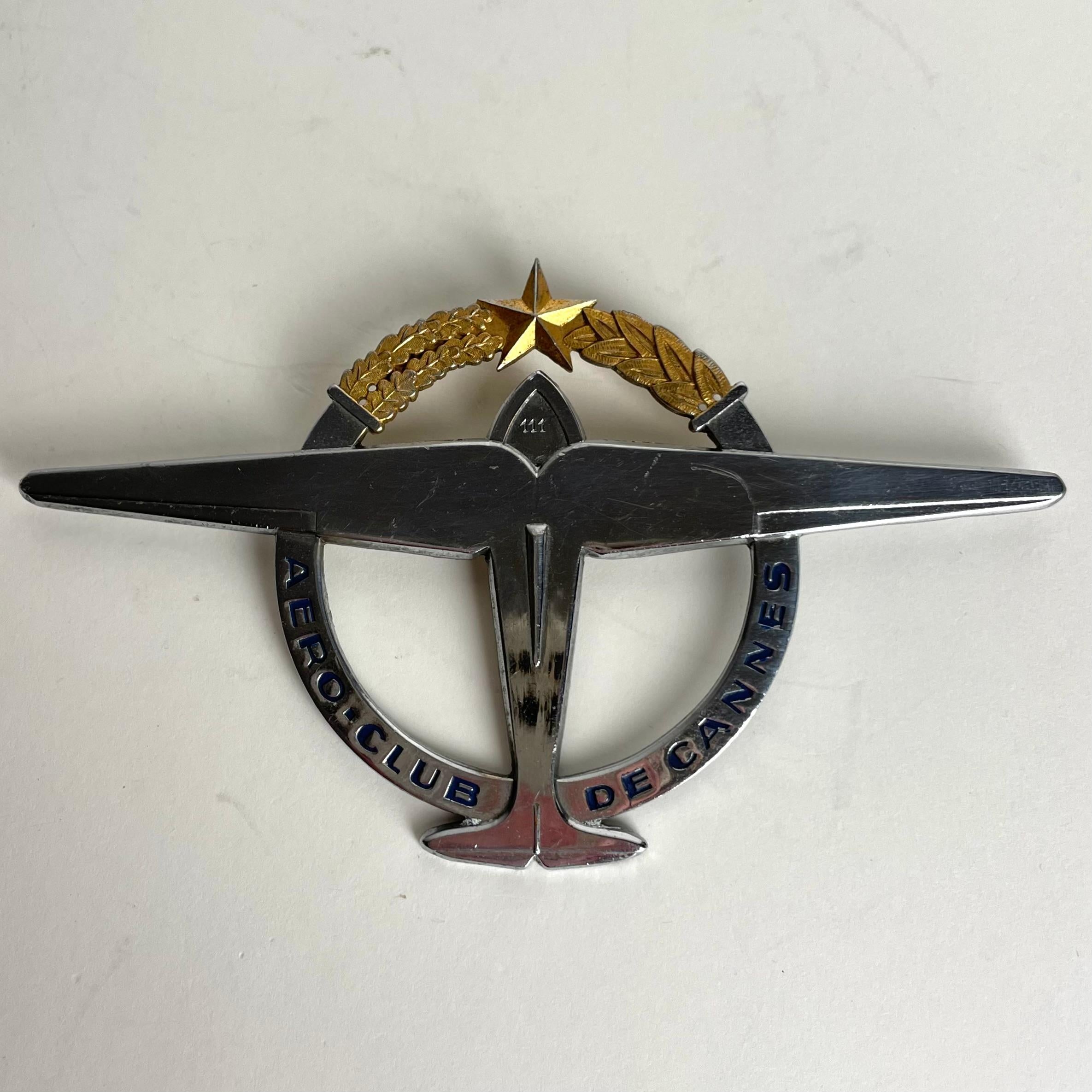 Very elegant Radiator Emblem, Aero-Club de Cannes, France from the 1930-40s. Made in chrome with gilt details. Number 111 in the Aero-Club de Cannes.

Wear consistent with age and use 