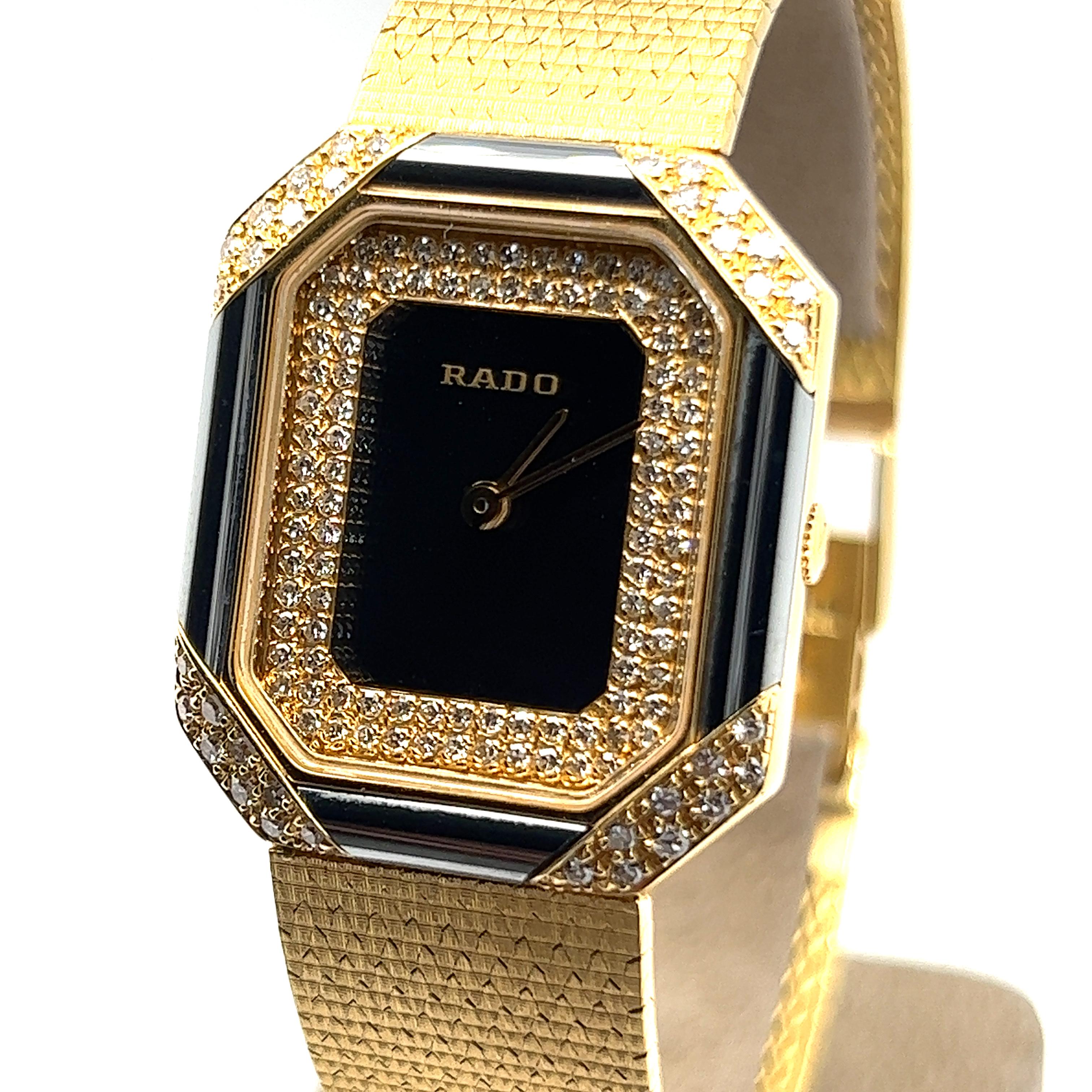 Unique RADO lady’s watch in 18 karat yellow gold. Case and dial set with 132 single-cut diamonds totalling approximate 1.30 ct. Case further set with four pieces of hematite. 

Beautiful and smooth bracelet in 18 karat yellow gold in top condition.