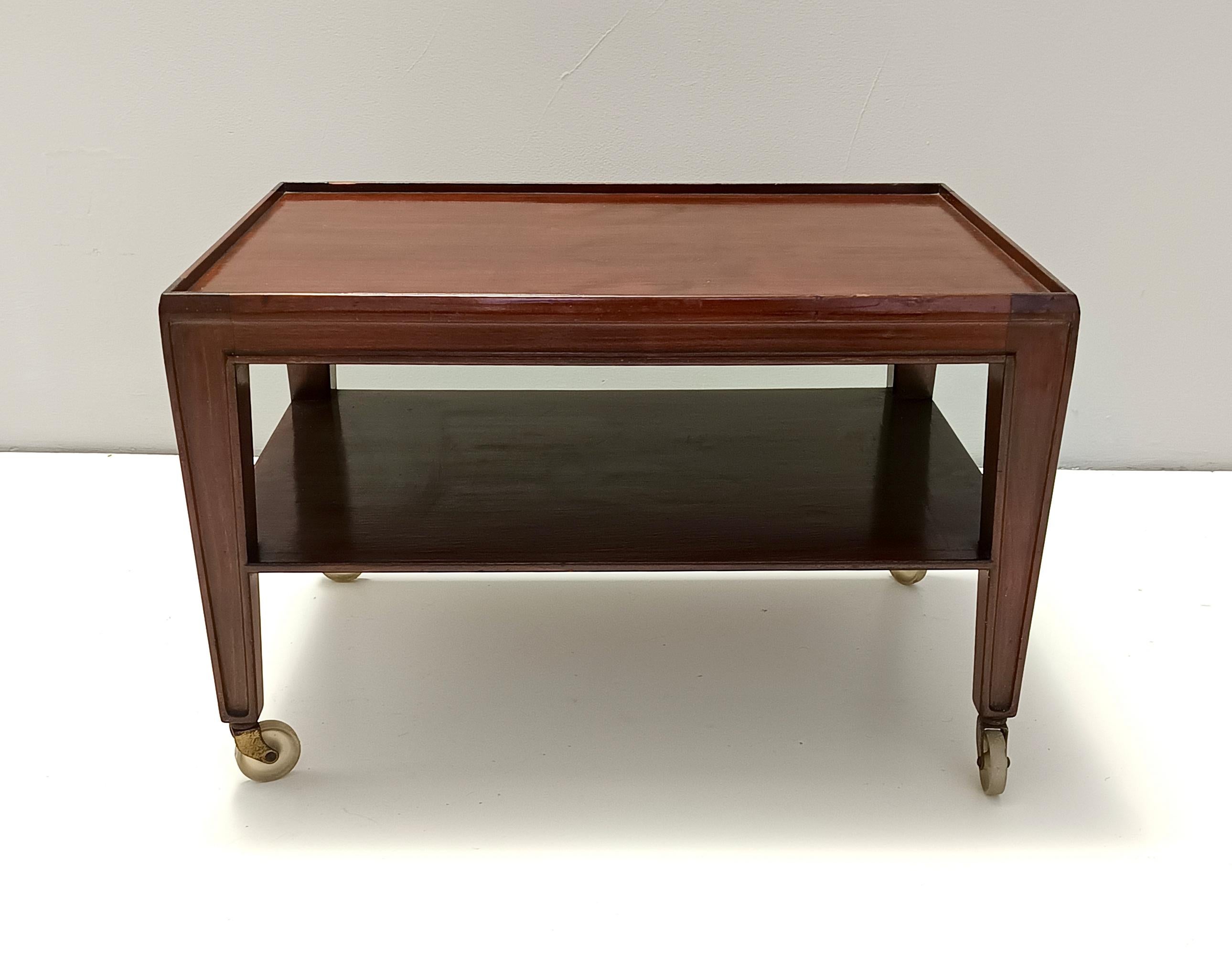 Ebonized Elegant Rectangular Walnut Coffee Table by Paolo Buffa with Casters, Italy For Sale