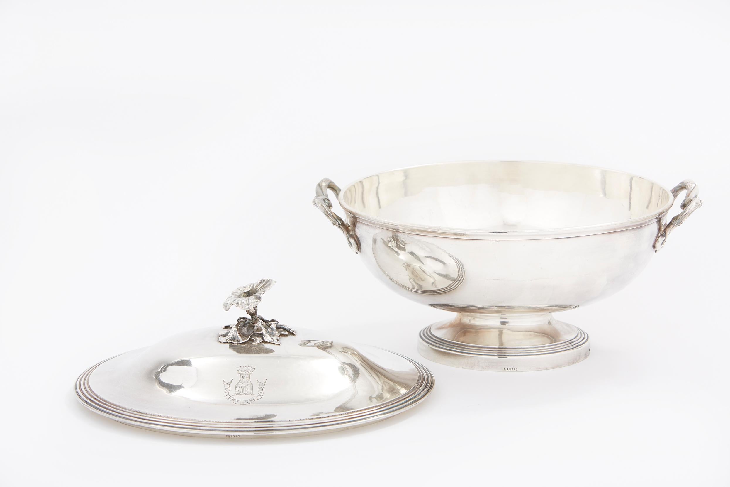 Elegant and refined French silver plated tableware covered soup tureen / serving piece with side handles and exterior design details. The tureen is in great condition. Minor wear consistent with age / use. Numbered & mark undersigned. The tureen
