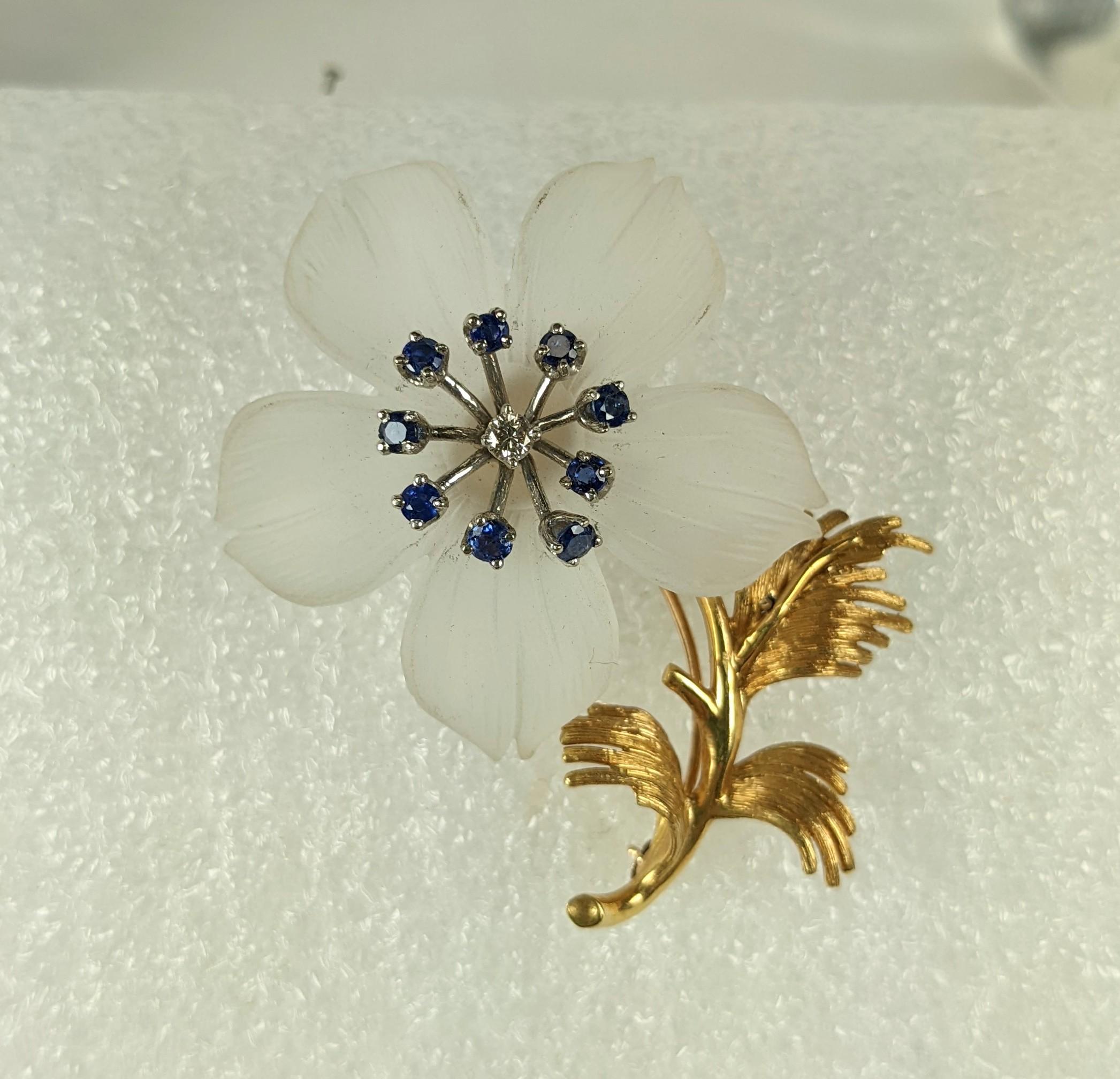 Lovely Rock Crystal Sapphire Diamond Flower Brooch set in 18k with a hand carved rock crystal flower head, with sapphire and diamond pistils set in white gold. 1960's USA. 