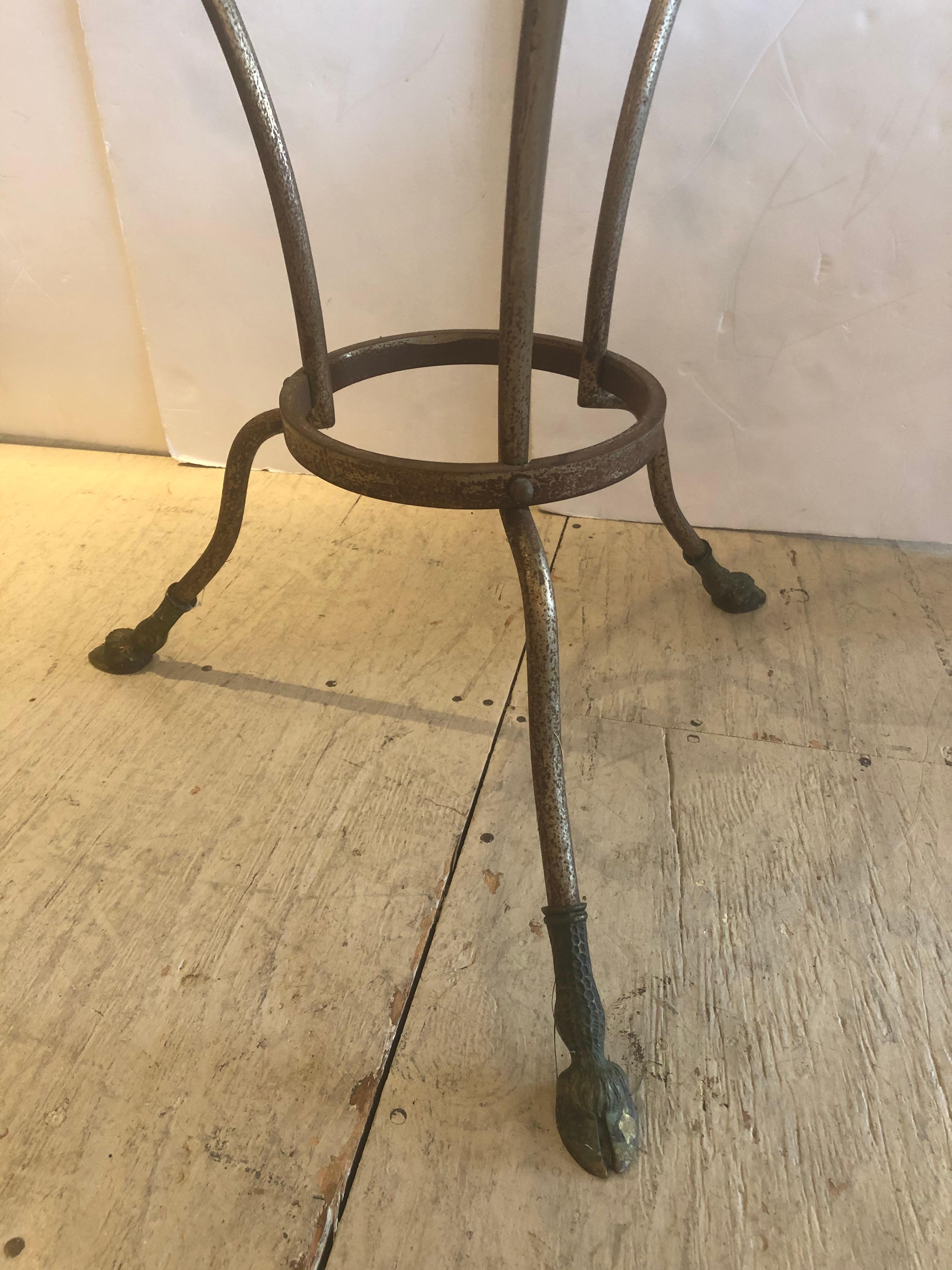 An elegant round side or end table having 3/4