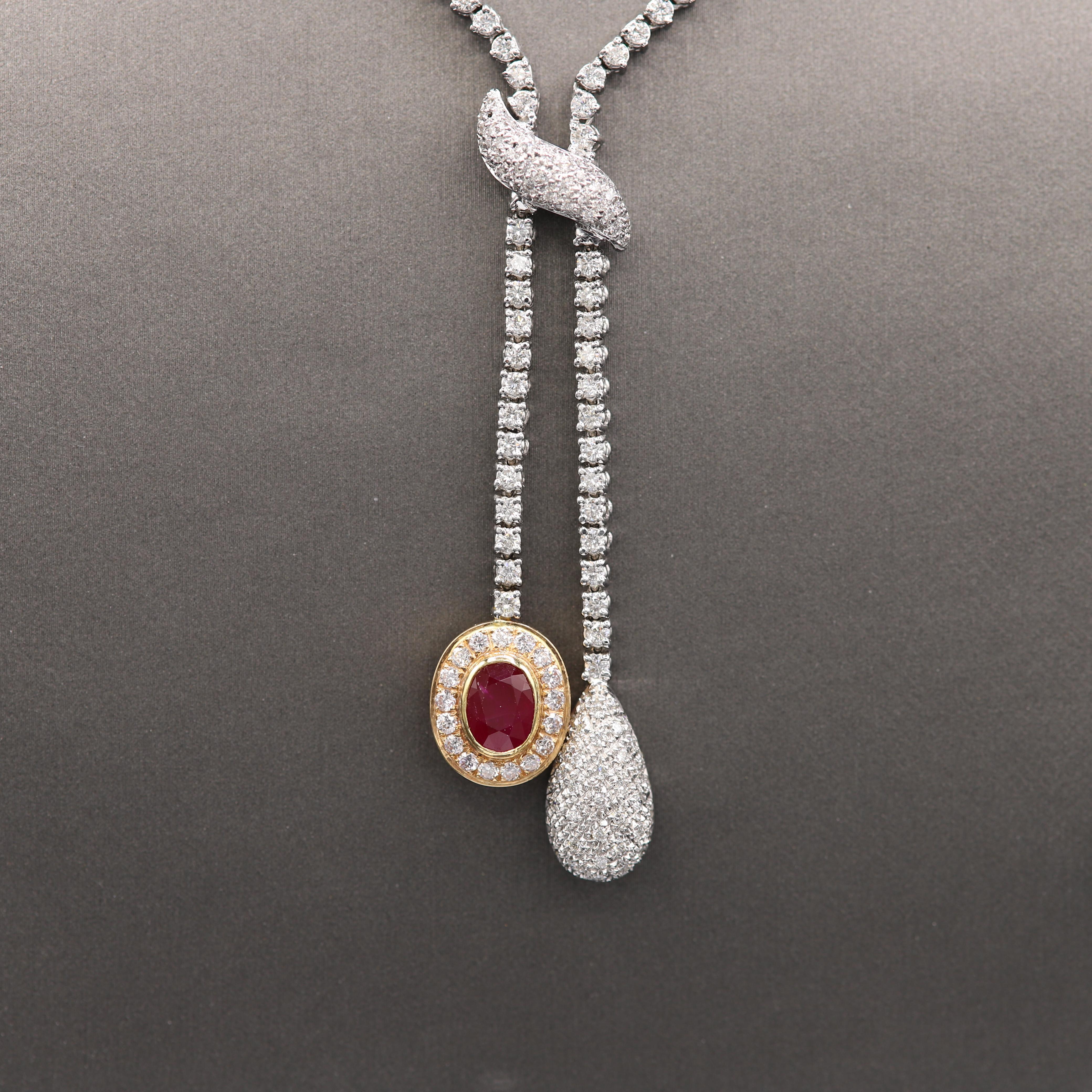 Unique Dangling Ruby and Diamonds
Impressive Elegant & Bold

18k white and some Rose Gold 39 Grams

Necklace neck Length 16' Inch

All Natural Stones *not treated