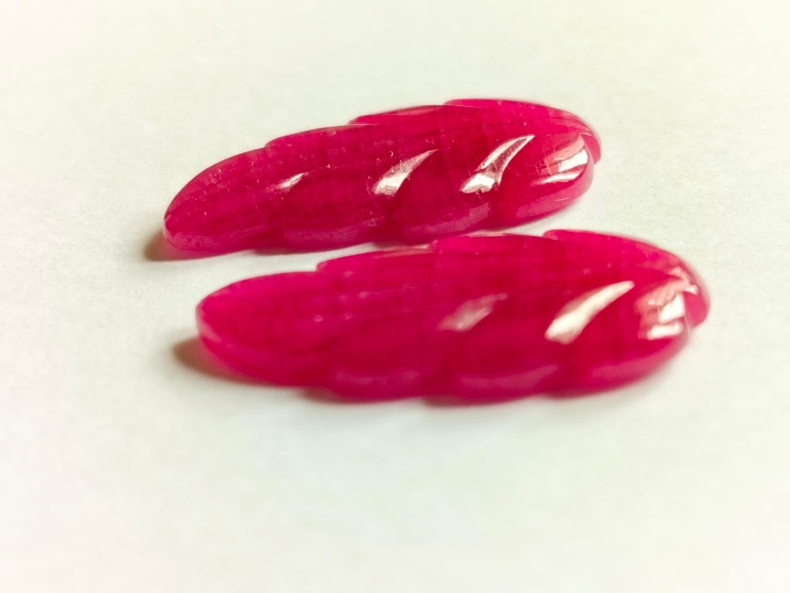 Tapered Baguette Elegant 21.75 Carat Ruby Carving Leaf Shape Pair Loose Gemstone  For Sale