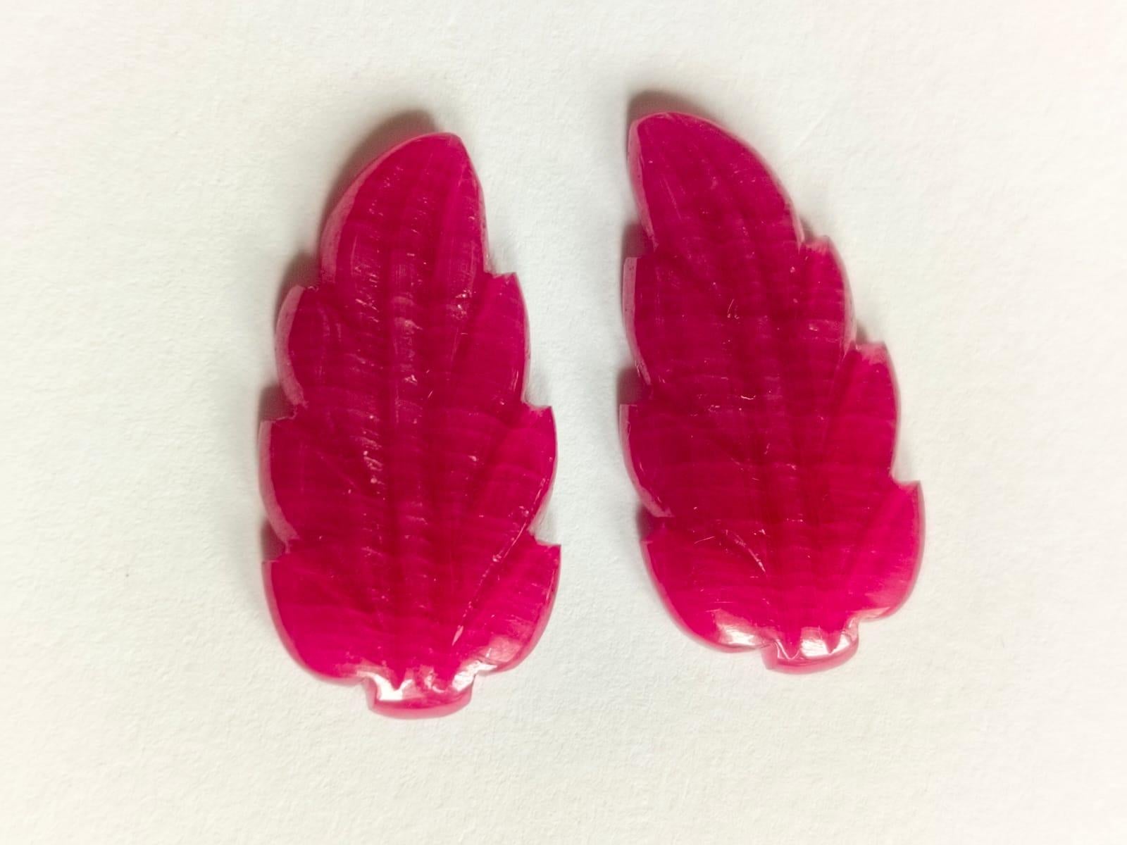 Tapered Baguette Elegant 21.75 Carat Ruby Carving Leaf Shape Pair Loose Gemstone  For Sale