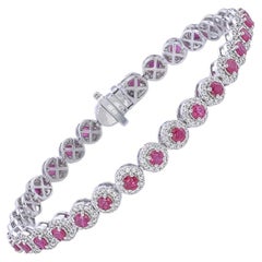 Elegantes Rubin- und Diamant-Halo-Tennisarmband aus Weißgold