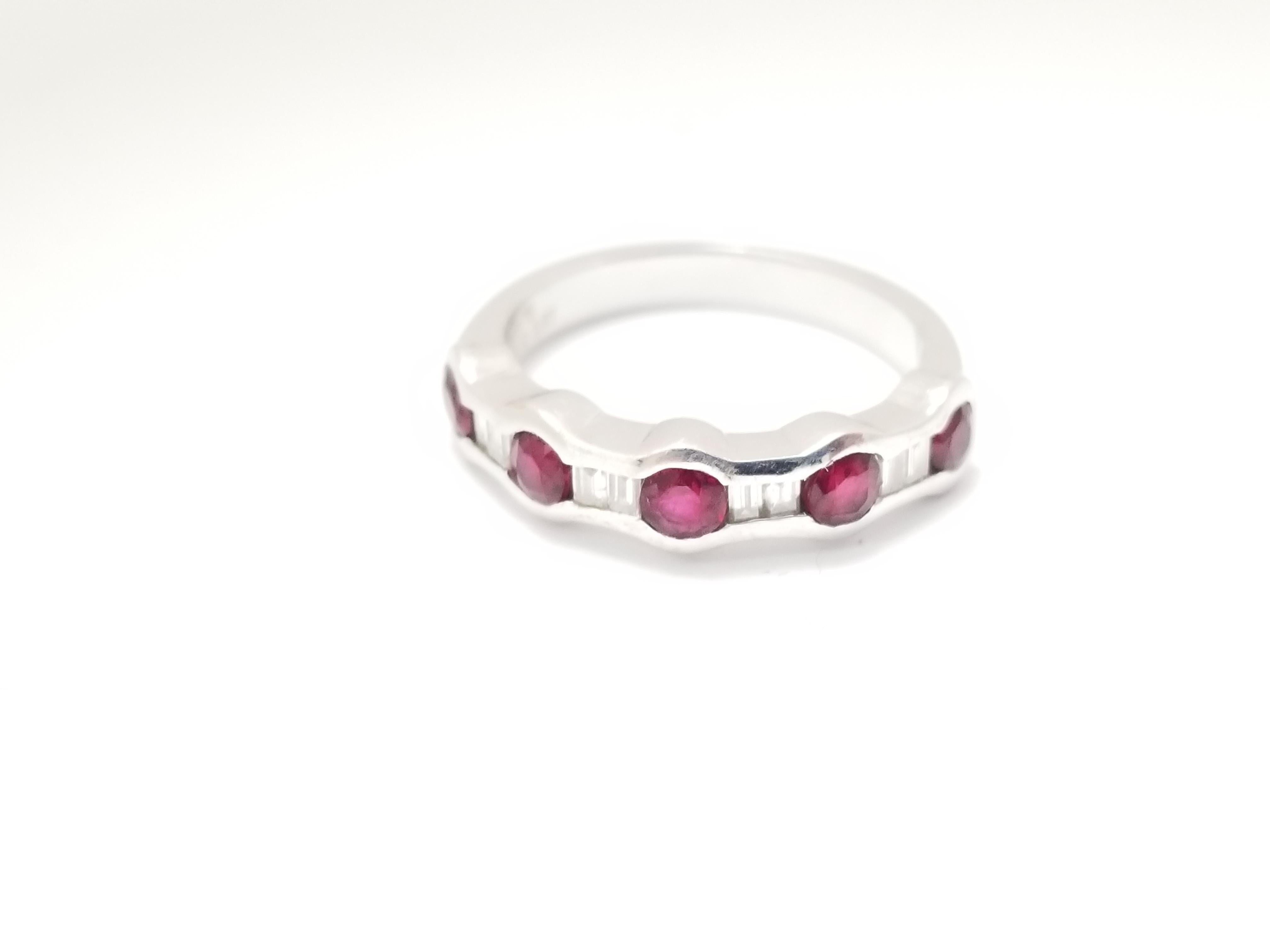 Genuine Ruby Round Shape diamonds ring 18K white gold. Unique, Brilliant, and Beautiful.
Ruby Size: 0.93 cttw
Diamonds: 0.24 cttw
Ring Size: 6.75
