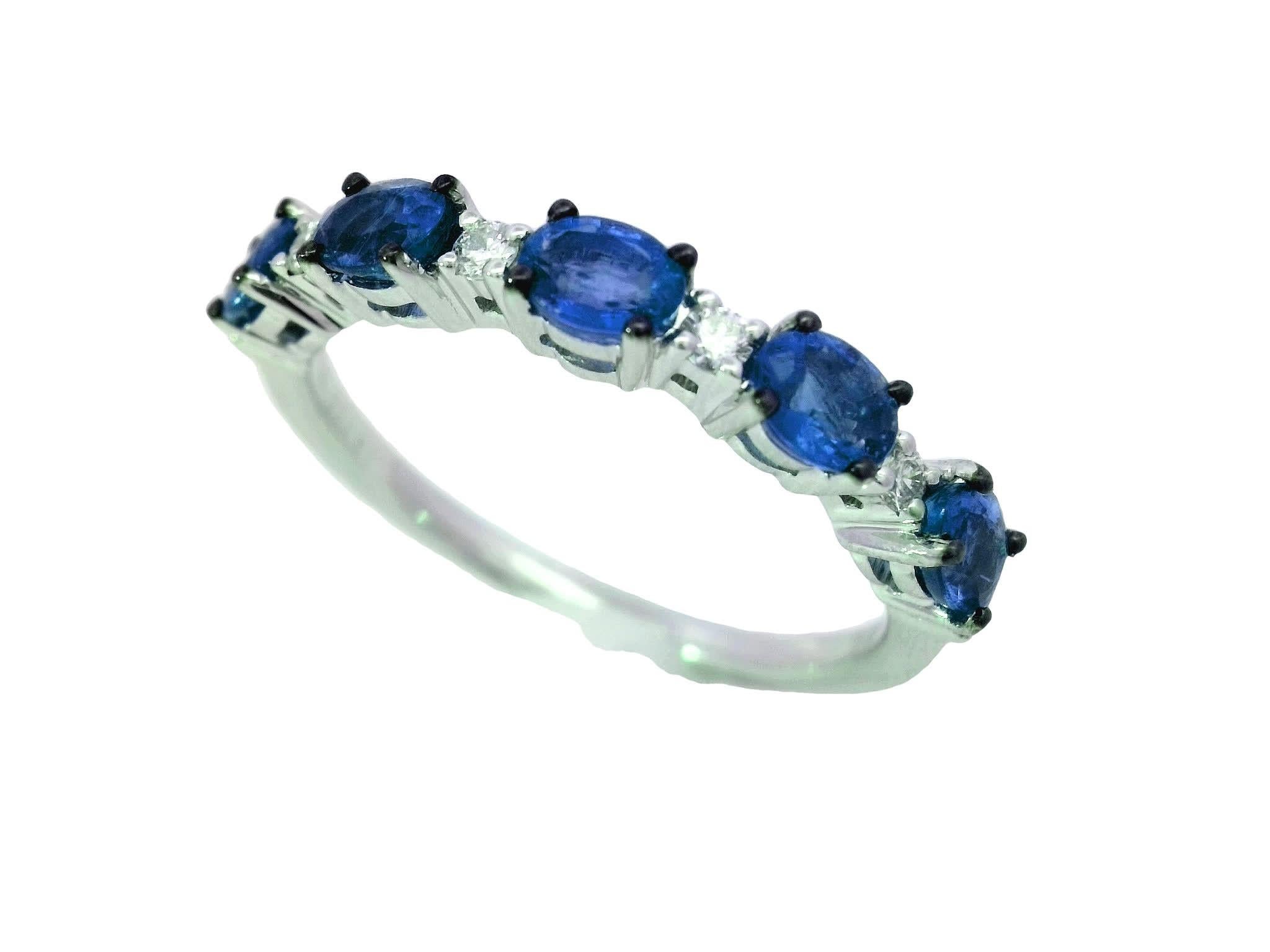 Discover the timeless beauty of this elegant sapphire and diamond ring. Crafted with precision, it features a stunning arrangement of deep blue sapphires complemented by sparkling diamonds, making it a perfect accessory for any occasion. Whether