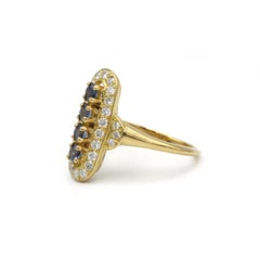 Elegant Sapphire & Diamond Halo Ring in 18 K Yellow Gold