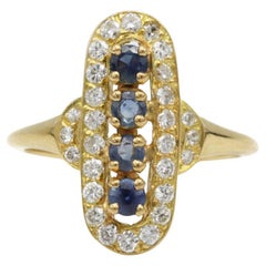 Elegant Sapphire & Diamond Halo Ring in 18 K Yellow Gold