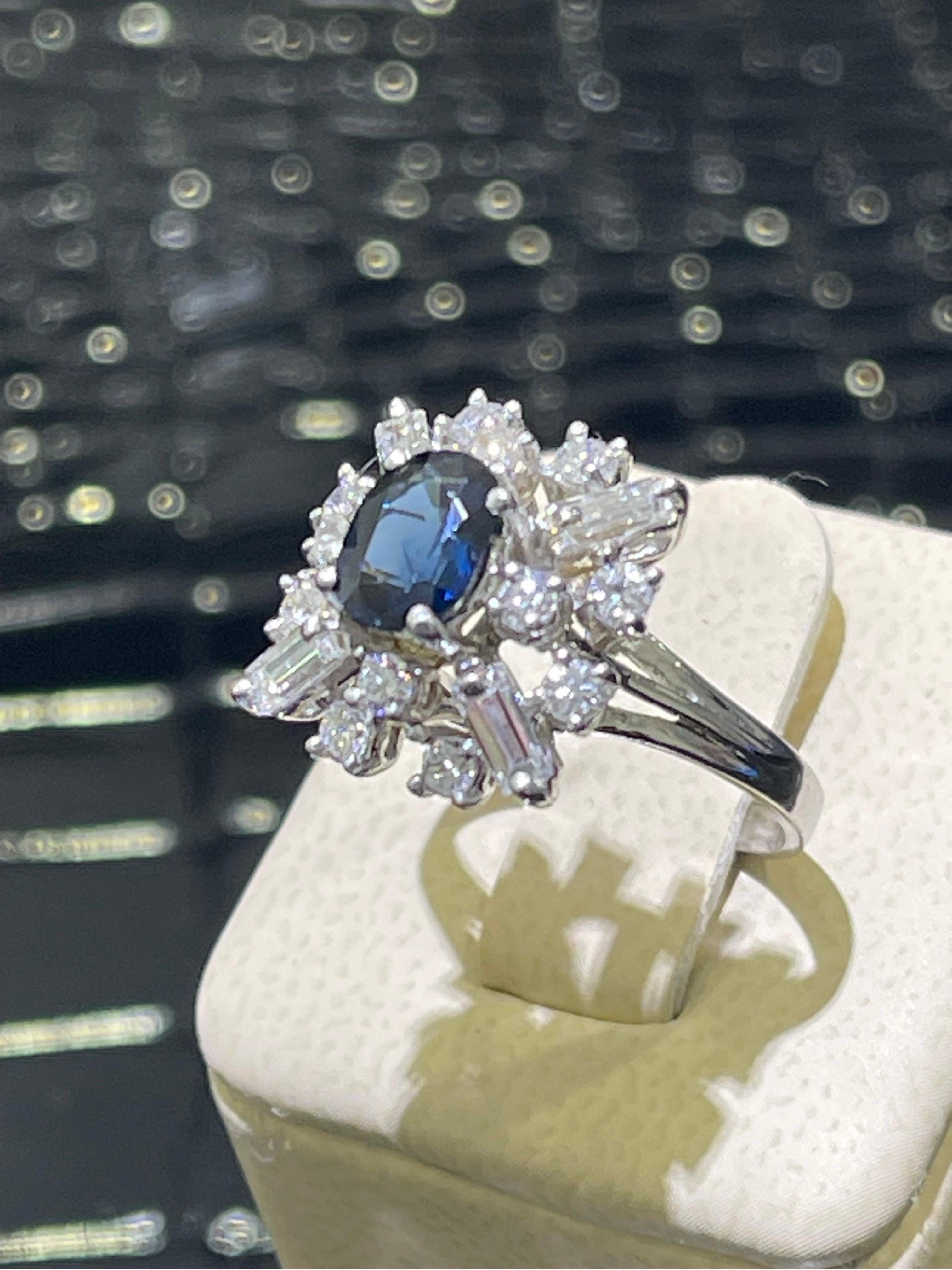 Elegant Sapphire & Diamond Ring In 14k White Gold.

Over 1 carat in round and baguette diamonds.

Size 6.5
