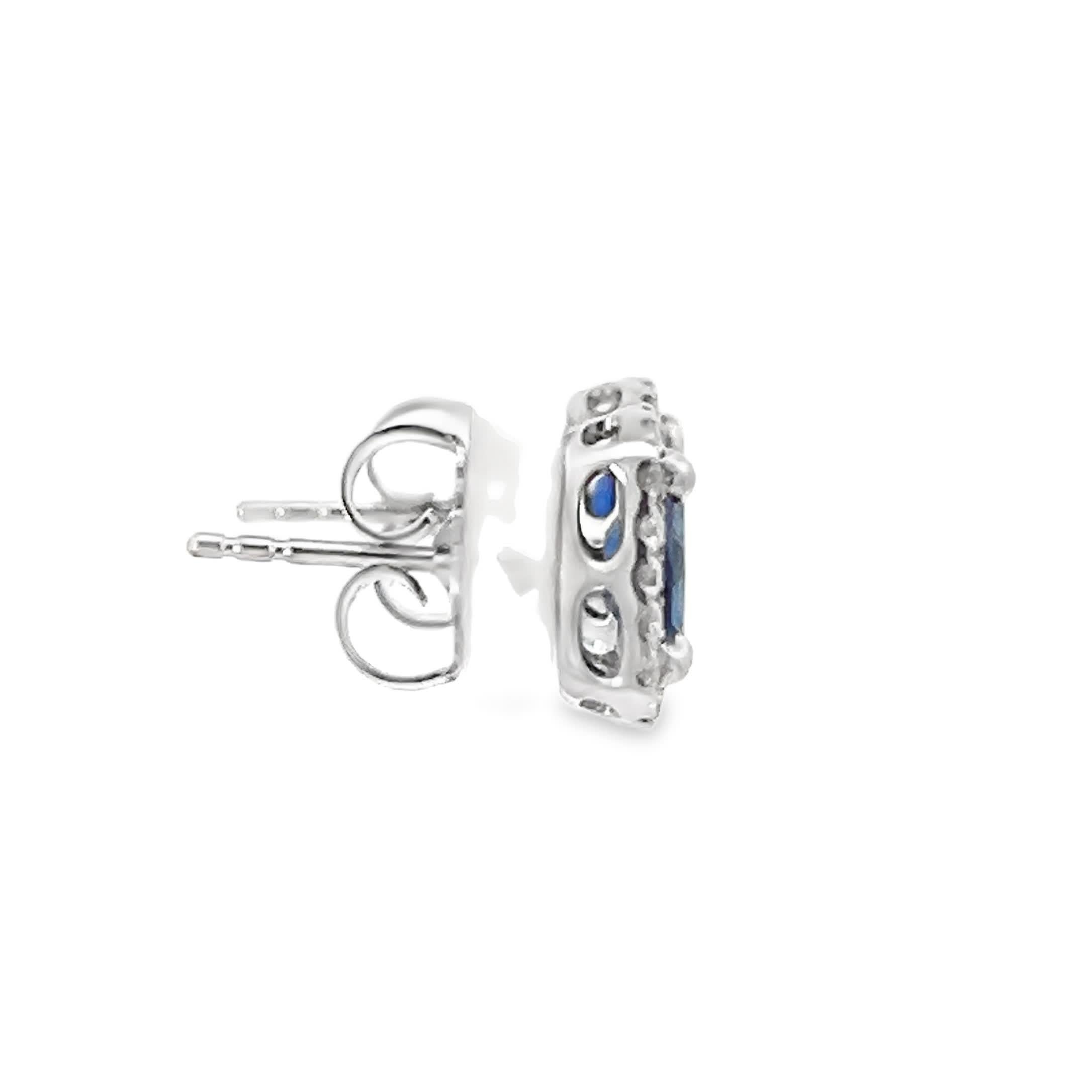 These stunning sapphire earrings feature deep blue gemstones encircled by sparkling diamonds. Perfect for adding a touch of elegance to any outfit, these earrings exude sophistication and style.