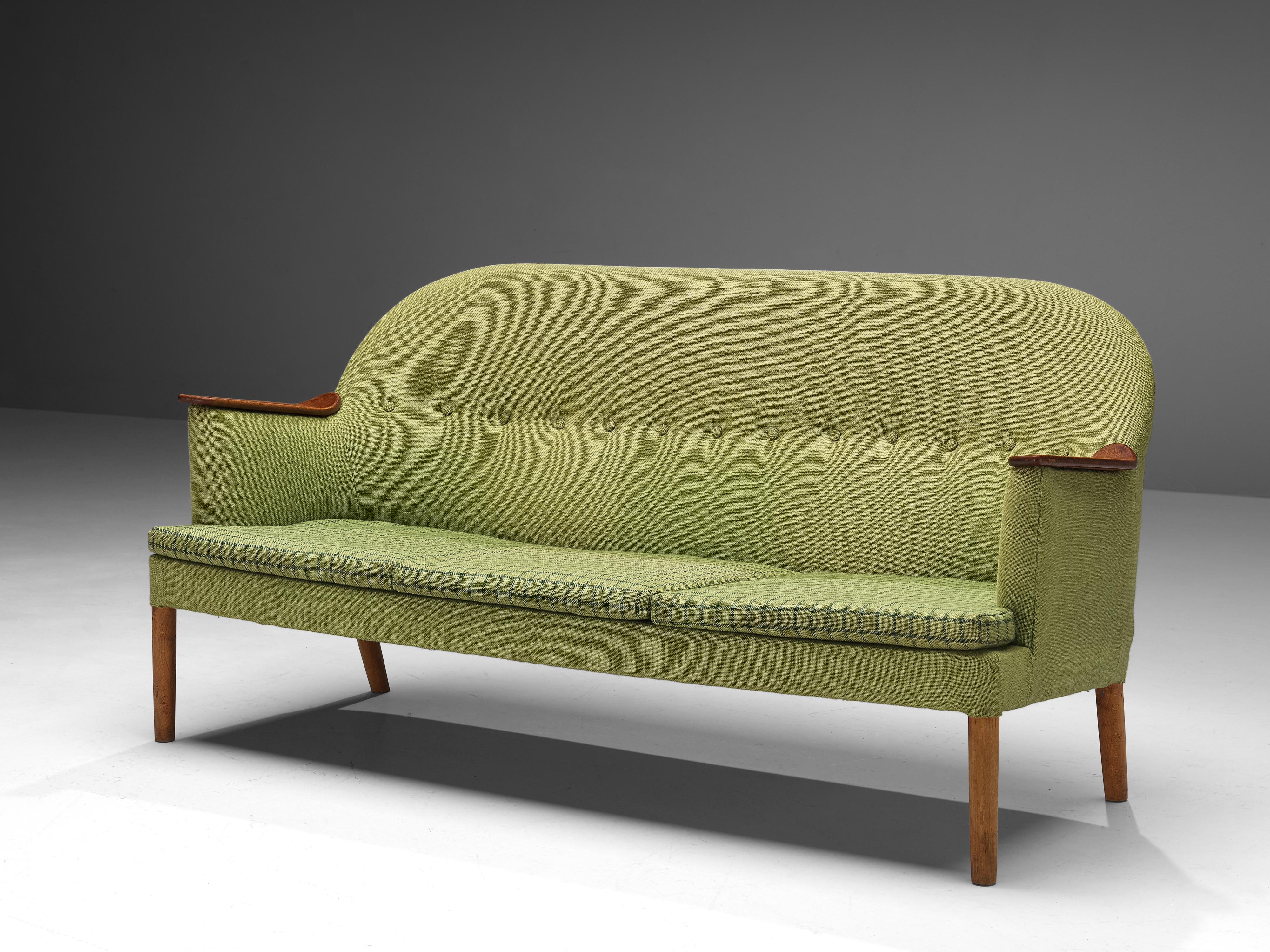 Sofa, fabric, teak, Scandinavia, 1950s

This understated sofa is an iconic example of Scandinavian design from the 1950s. Organic and sculptural, this sofa is anything but minimalistic. Equipped with conical-shaped feet that gradually diverge, give