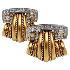 Elegante Schnörkelohrringe aus 18 Karat Gold mit handgedrehten Drahtseildetails