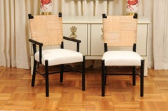 Elegant Set of 14 Rush Cane Dining Chairs in Black Lacquer by John Hutton