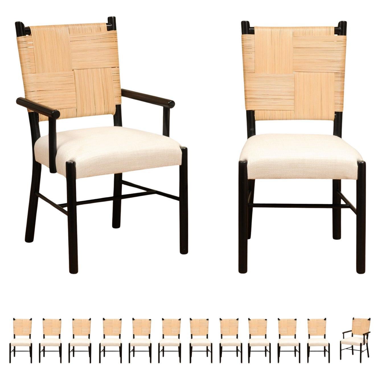 Elegant Set of 14 Rush Cane Dining Chairs in Black Lacquer by John Hutton   For Sale