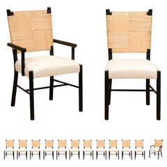 Elegant Set of 14 Rush Cane Dining Chairs in Black Lacquer by John Hutton  