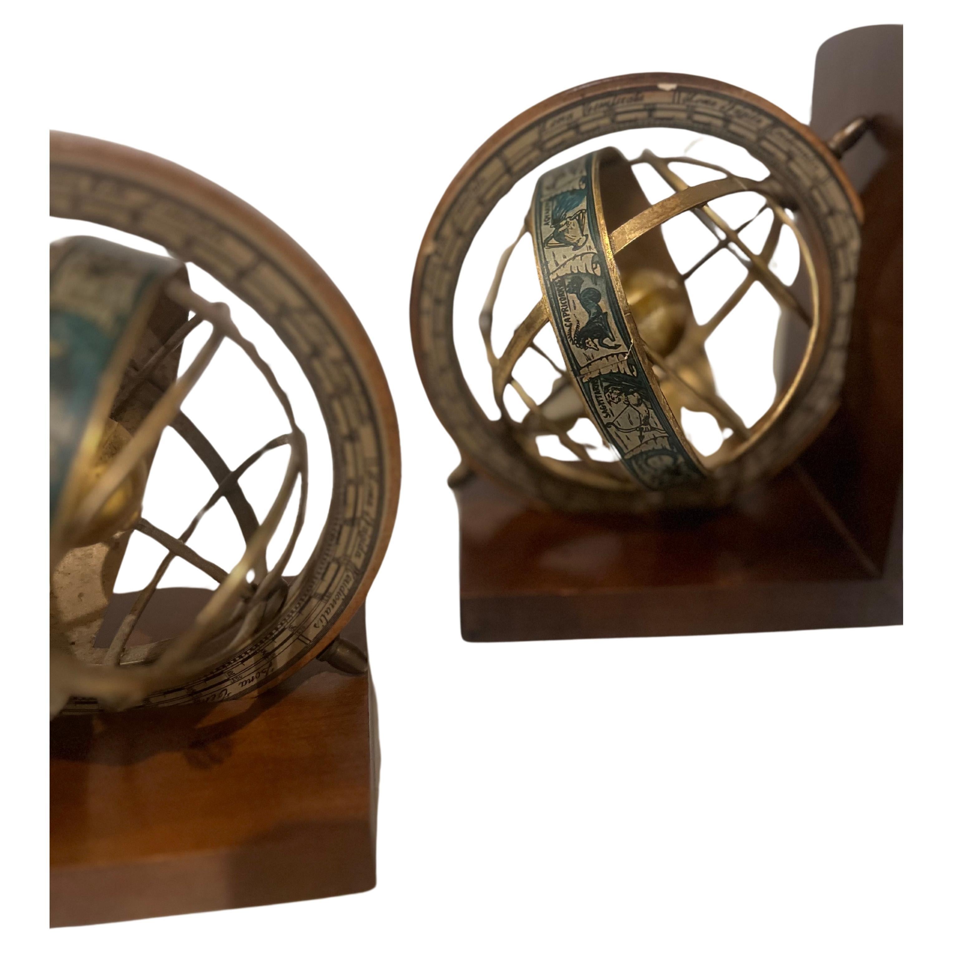 Beautiful elegant rotating globe in brass ,sitting on solid cherry wood base pair of Globe bookends , circa 1970's made in Italy, nice condition great unique gift.