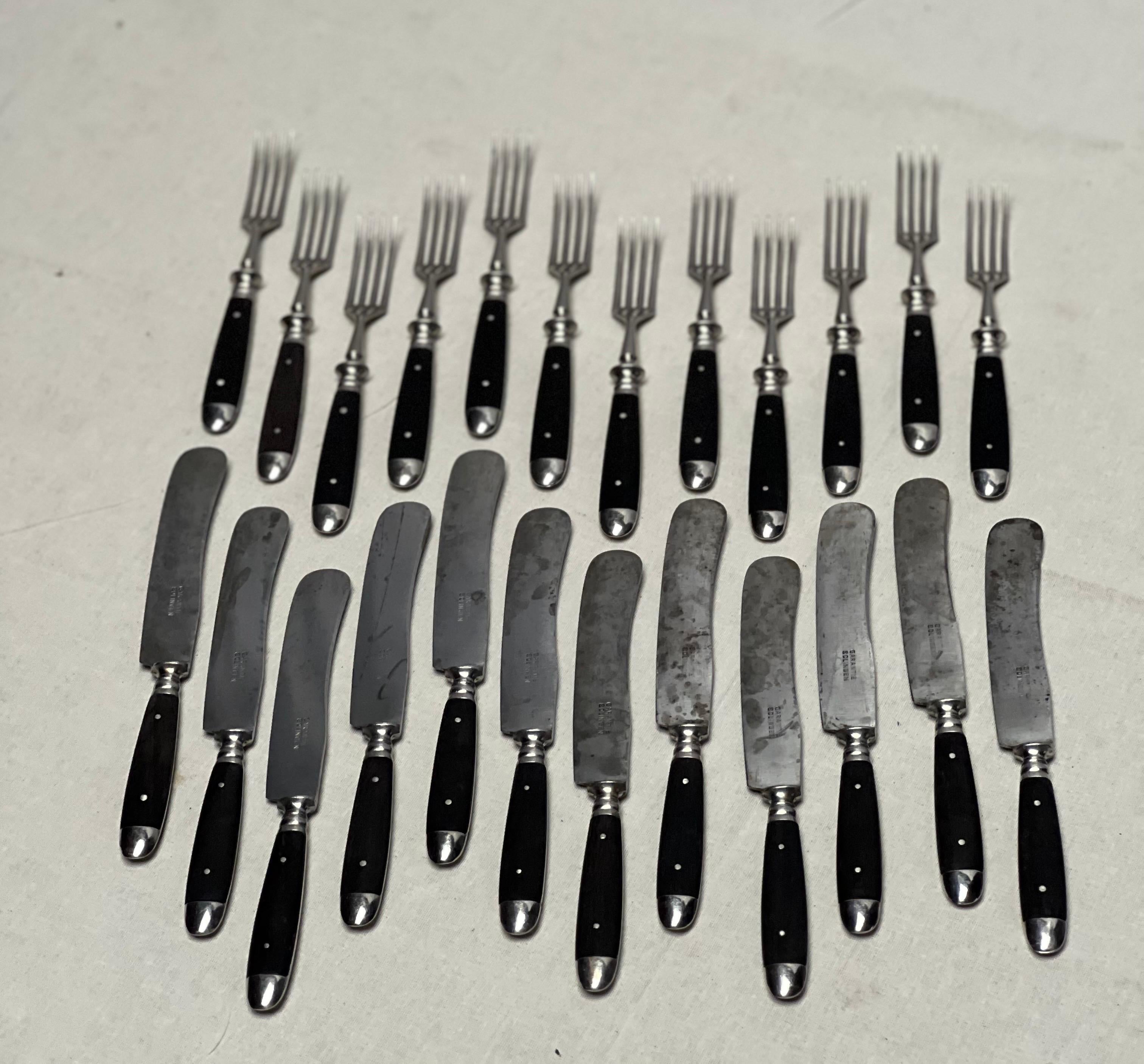 Elegant set of classical 1930's cutlery for 12, Made of wood and iron. For Sale 2