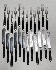 Elegant set of classical 1930's cutlery for 12, Made of wood and iron.