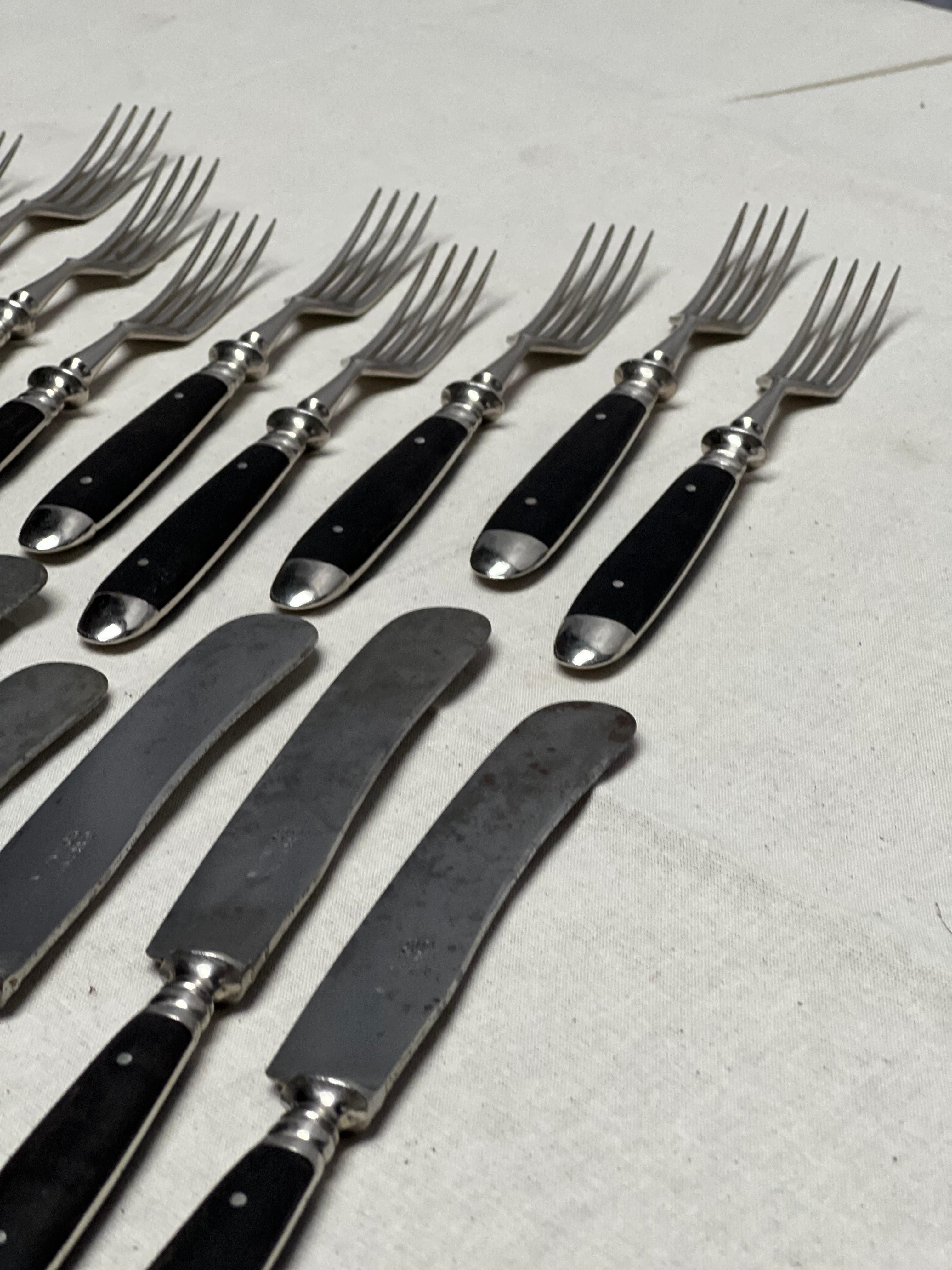 Mid-20th Century Elegant set of classical 1930's cutlery for 12, Made of wood and iron. For Sale