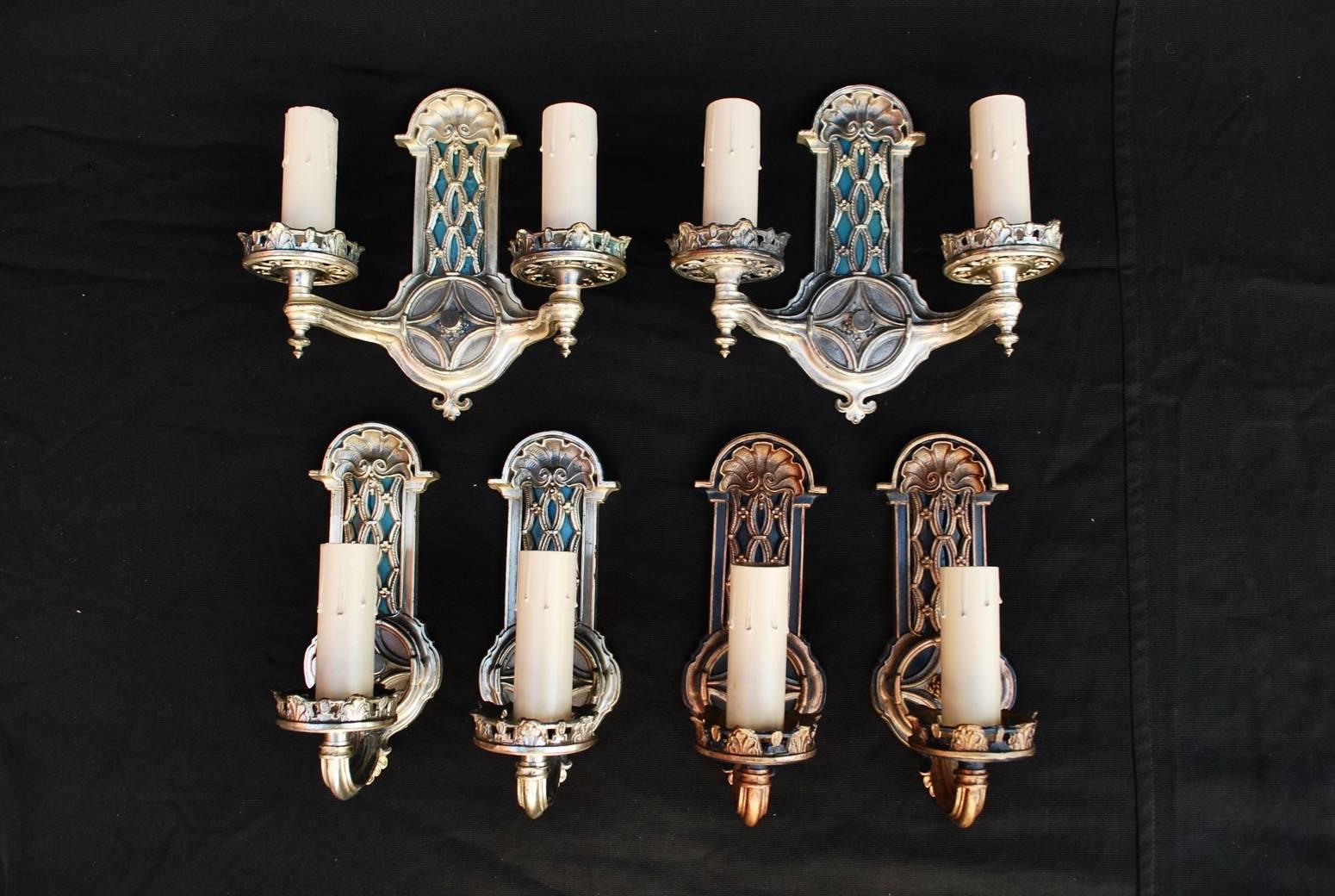 A beautiful set of four silver sconces, we have another pair but with a different color (see picture) price is for the set of four.


 