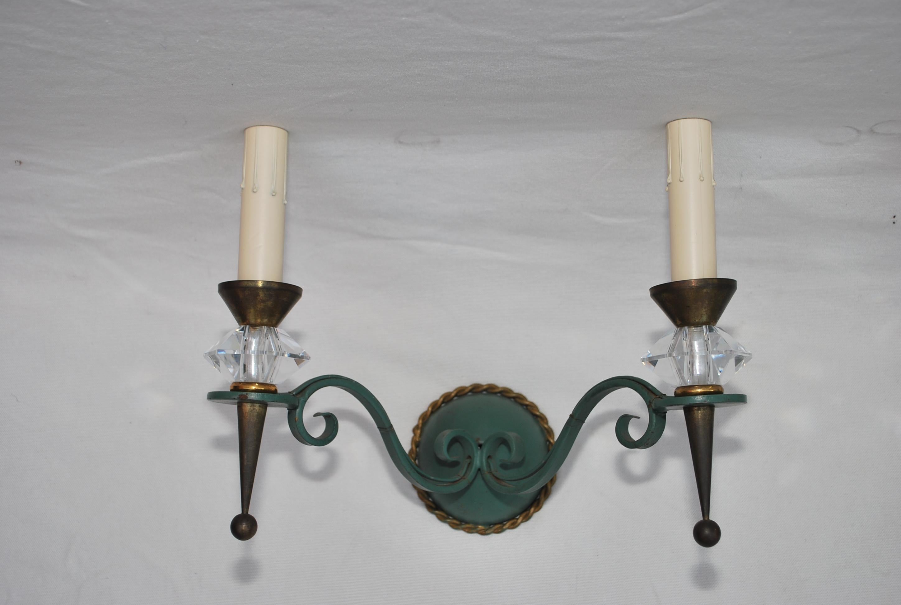 Elegant set of four iron/crytal sconces design by Jules Leleu For Sale 1