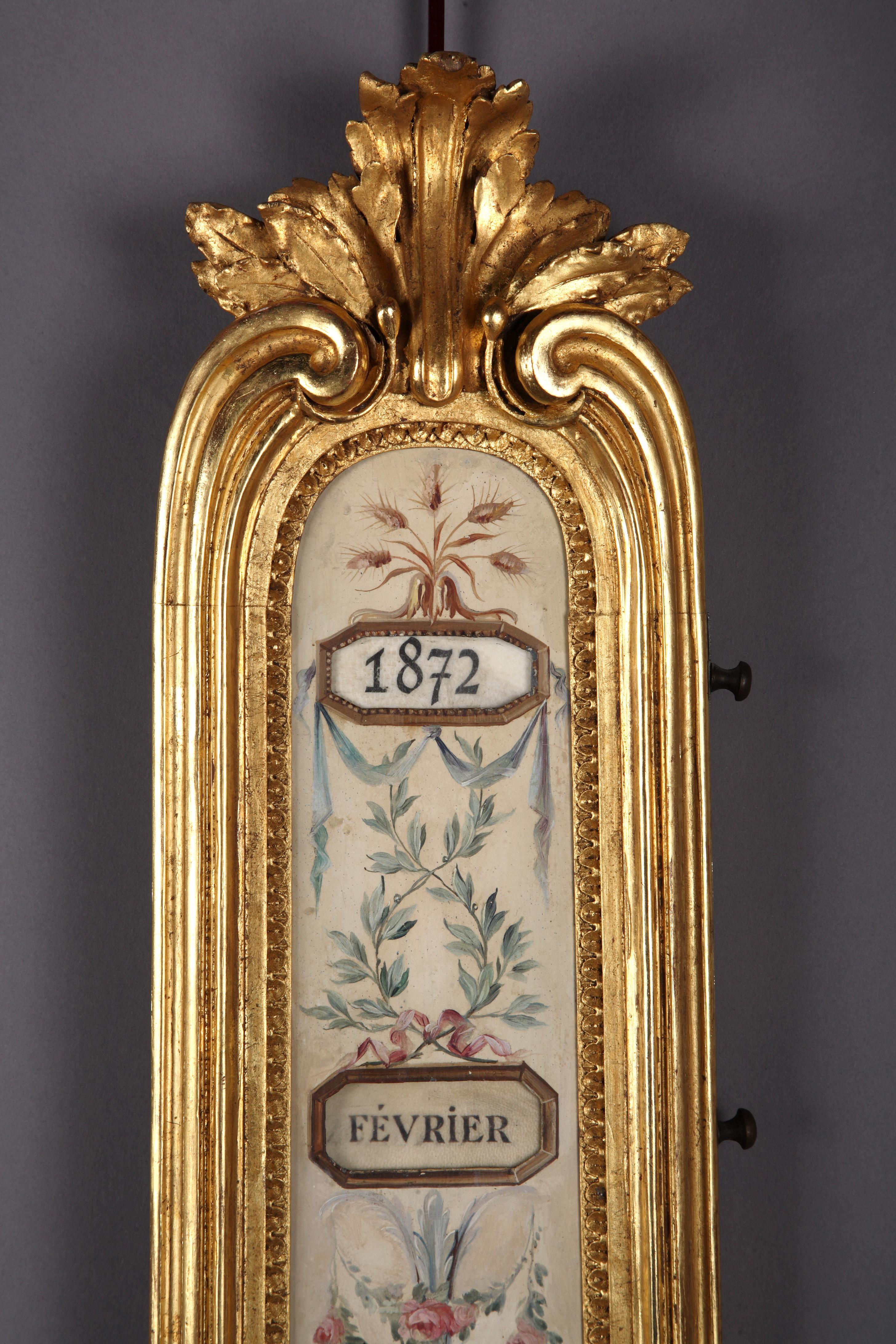 Elégant ensemble de style Louis XVI comprenant un thermomètre et un calendrier perpétuel attribué à F. Linke. Chacune est constituée d'une plaque en métal, peinte de motifs floraux sur fond beige : pour le calendrier, quatre ouvertures affichant