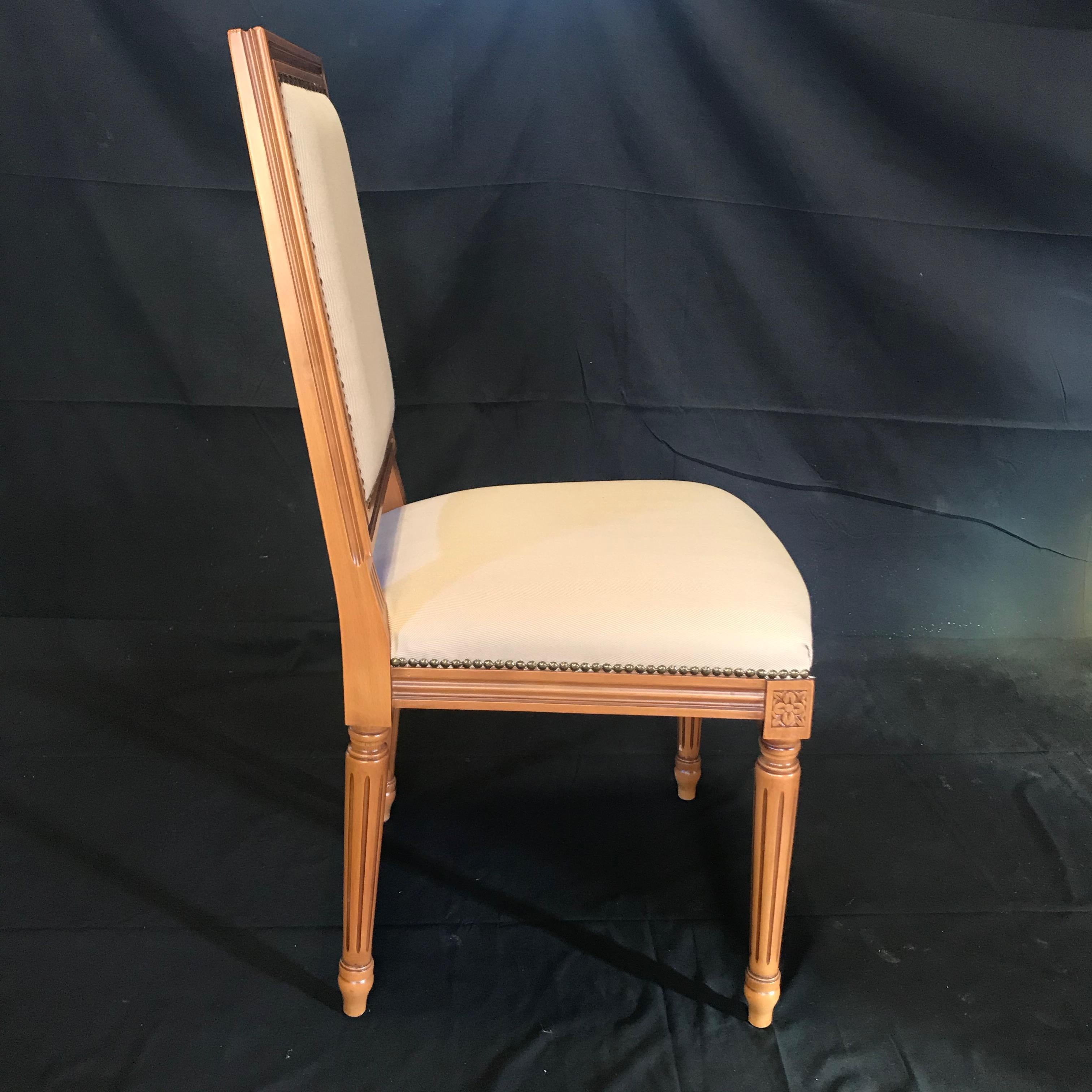 Early 20th Century Elegant Set of Louis XVI Style Walnut and Upholstered Dining Chairs