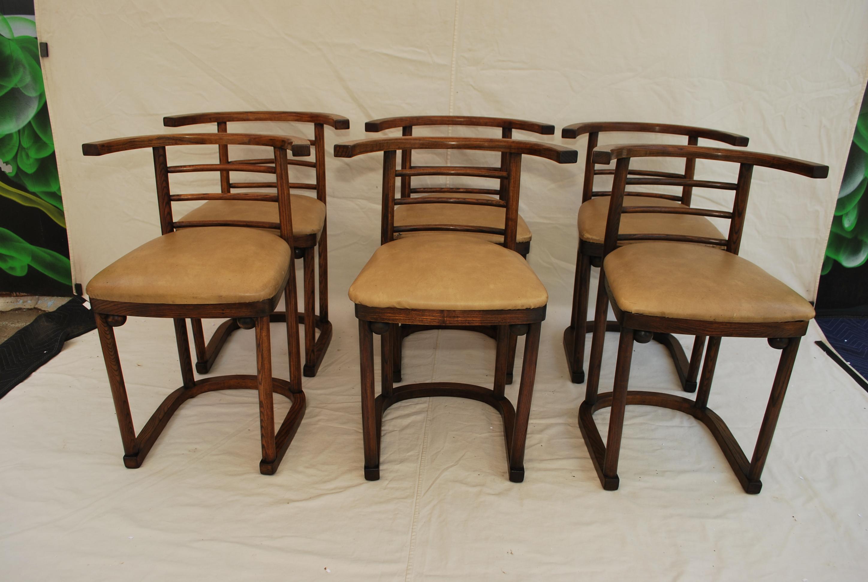 A beautiful set of six 1940's cabaret chairs design by Josef Hoffmann, for toanet made of oak wood, the patina is much nicer in person