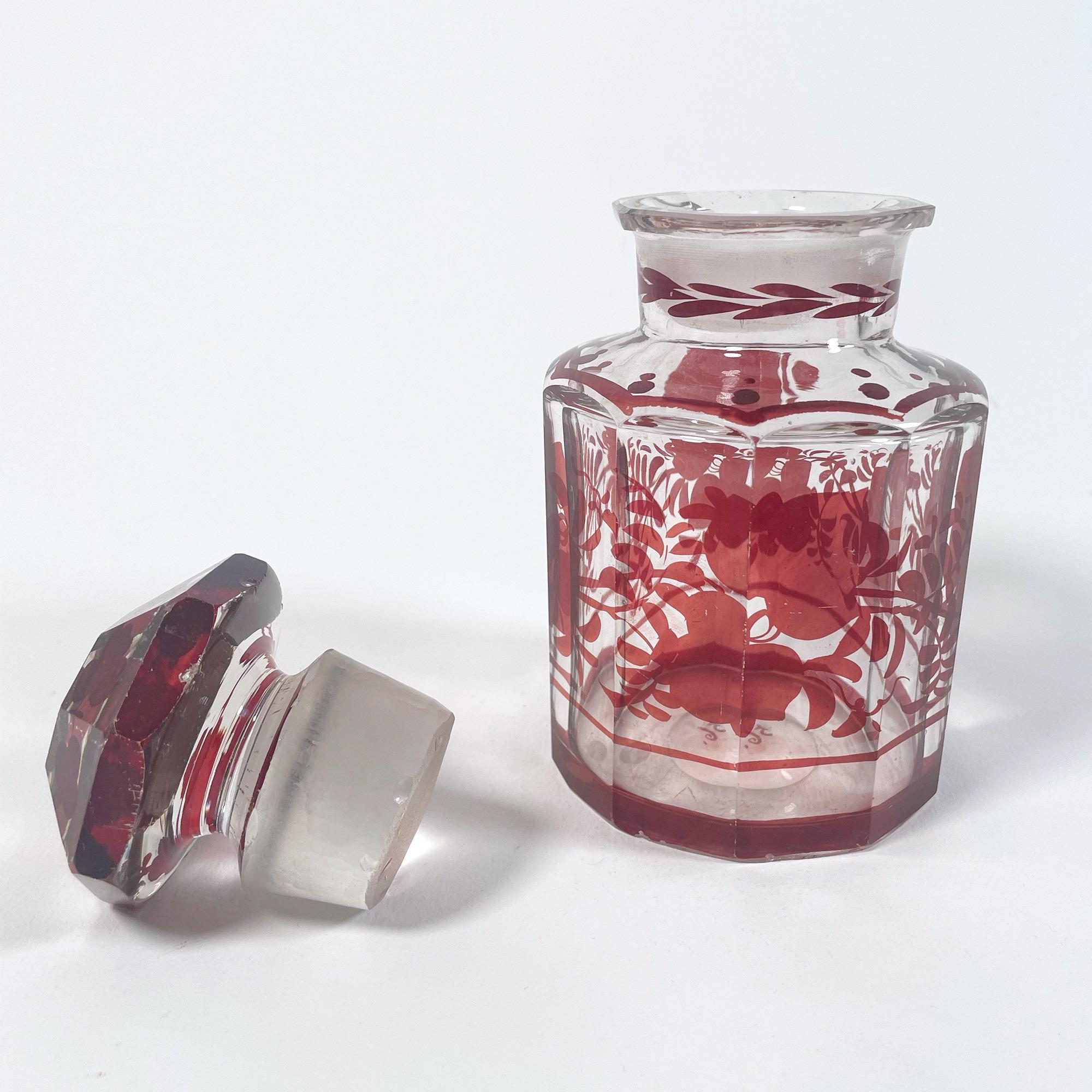 20th Century Elegant Set of Three 1940s Red Glass Bottles with Applied Relief Decoration For Sale