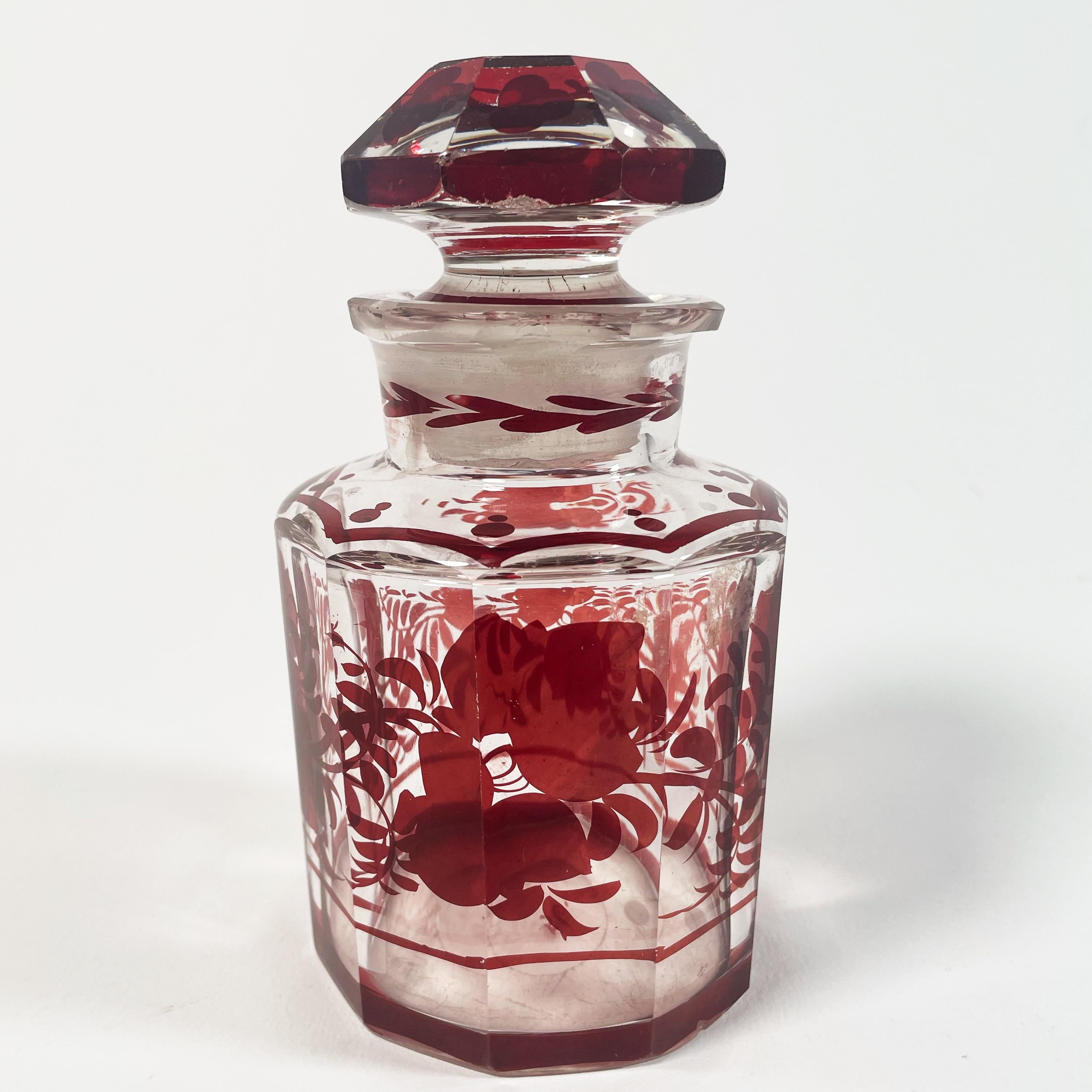 Elegant Set of Three 1940s Red Glass Bottles with Applied Relief Decoration For Sale 2