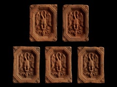 Elegant Set of Tiles with Mysterious Winged Creature Relief