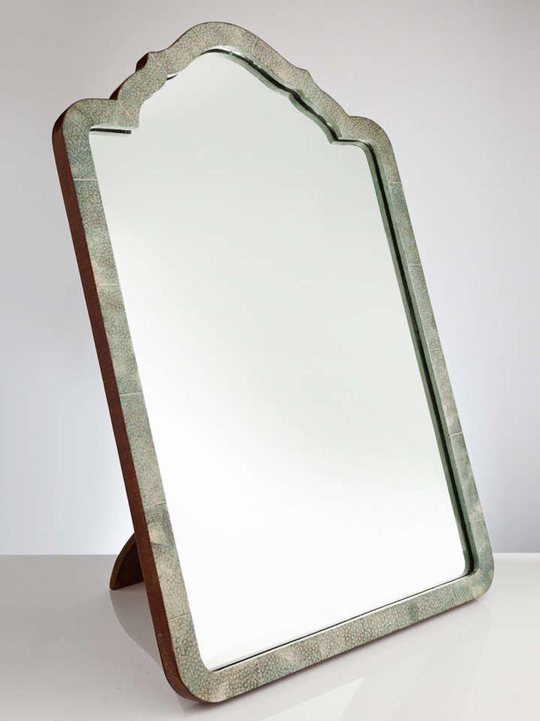 An elegant pale green shagreen French Art Deco table mirror circa 1930 with a wonderful arch-top form.

On reverse it has an easel leg or if needed could be hung.

We are always adding to our 1stdibs catalogue so be sure to add us to your