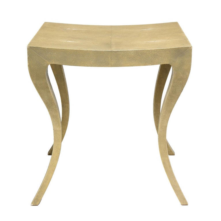 Elegant side table with serpentine legs in taupe shagreen. American 2011.