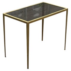 Elegant sidetable in brass with toned glass, from the 1960's