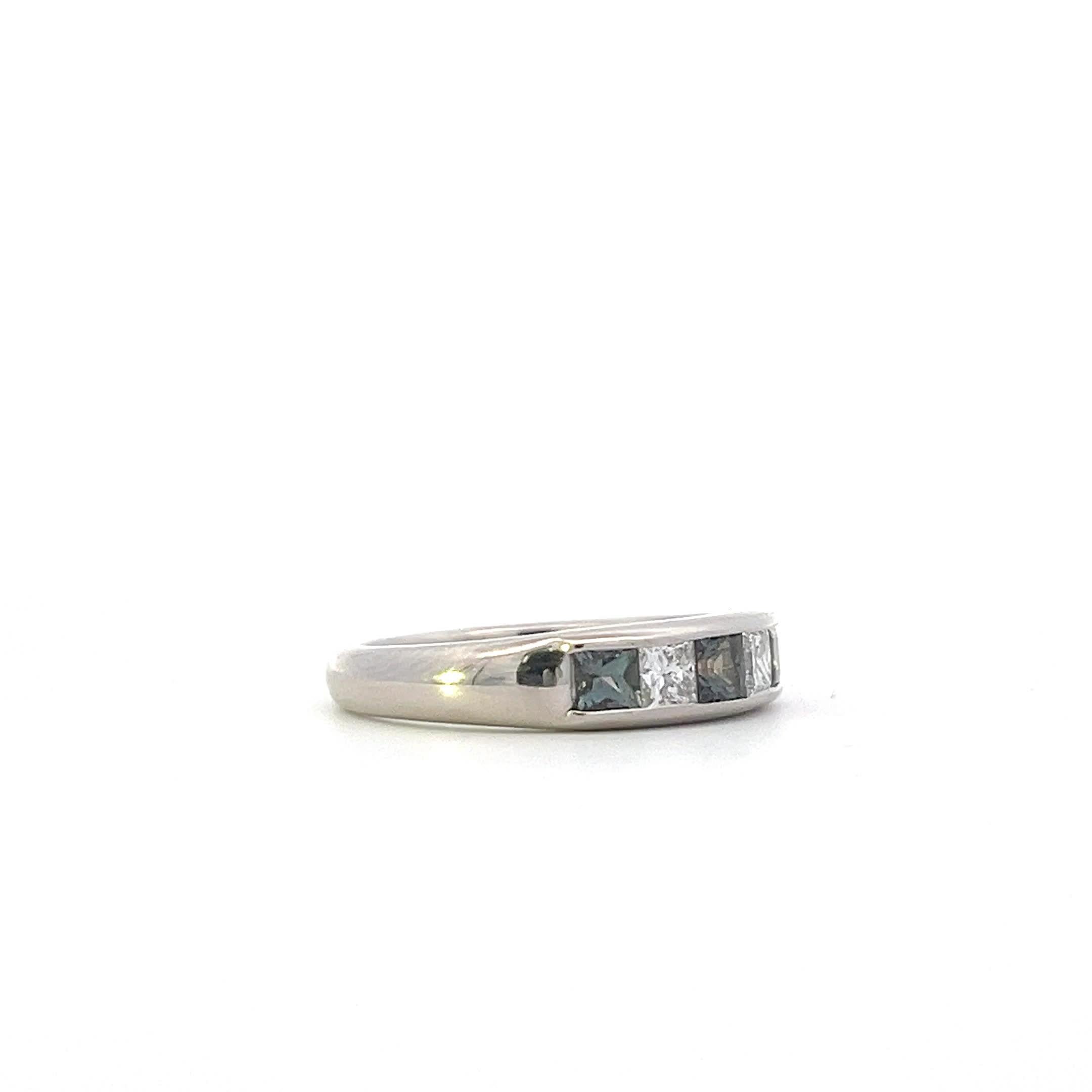 Discover the beauty of this elegant silver ring, featuring a stunning arrangement of gemstones. The intricate design showcases a blend of sparkling diamonds and rich-colored stones, making it a perfect accessory for any occasion. Whether you're