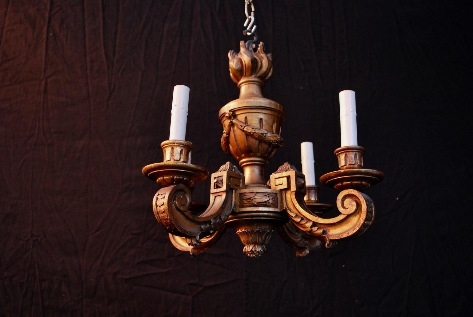 A beautiful small French wood chandelier, the patina is so much nicer in person, would be perfect for a powder room.

 